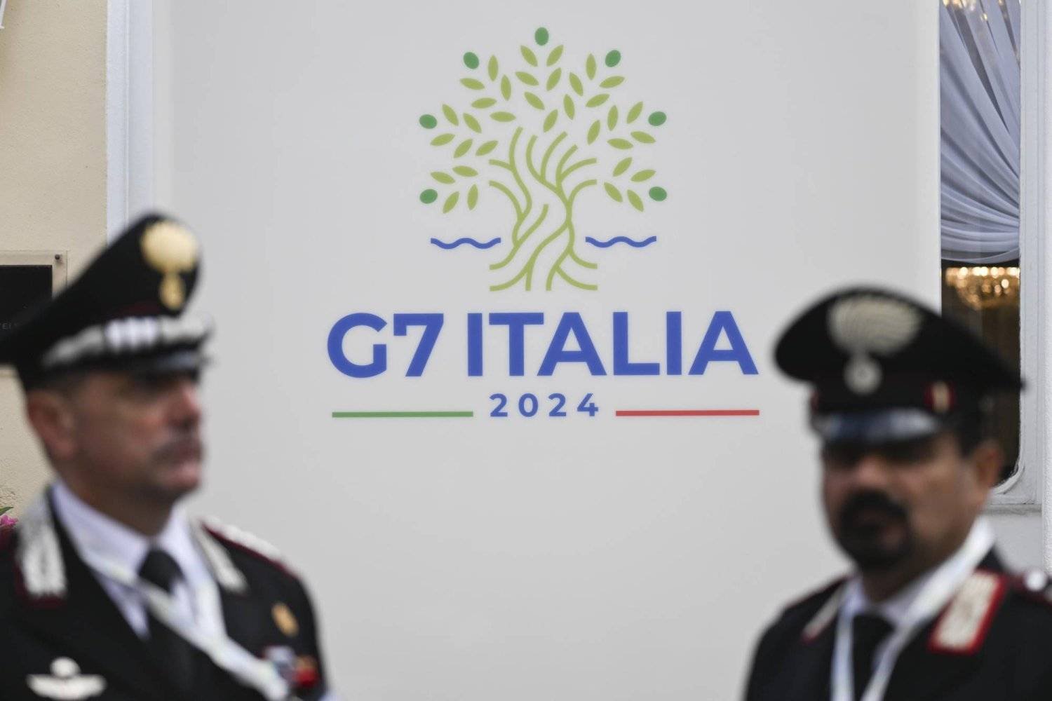 Italian Carabinieri officers stand guard outside the Quisisana hotel, a venue of the G7 Foreign Ministers summit, in Capri, southern Italy, 17 April 2024. EPA/CIRO FUSCO