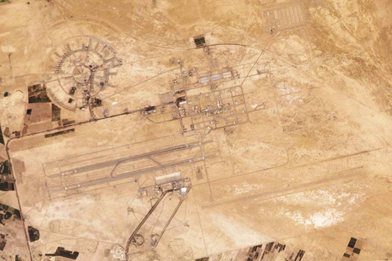 This satellite image from Planet Labs PBC shows the dual-use civilian airport and air base in Isfahan, Iran, Thursday, April 18, 2024. (Planet Labs PBC via AP)