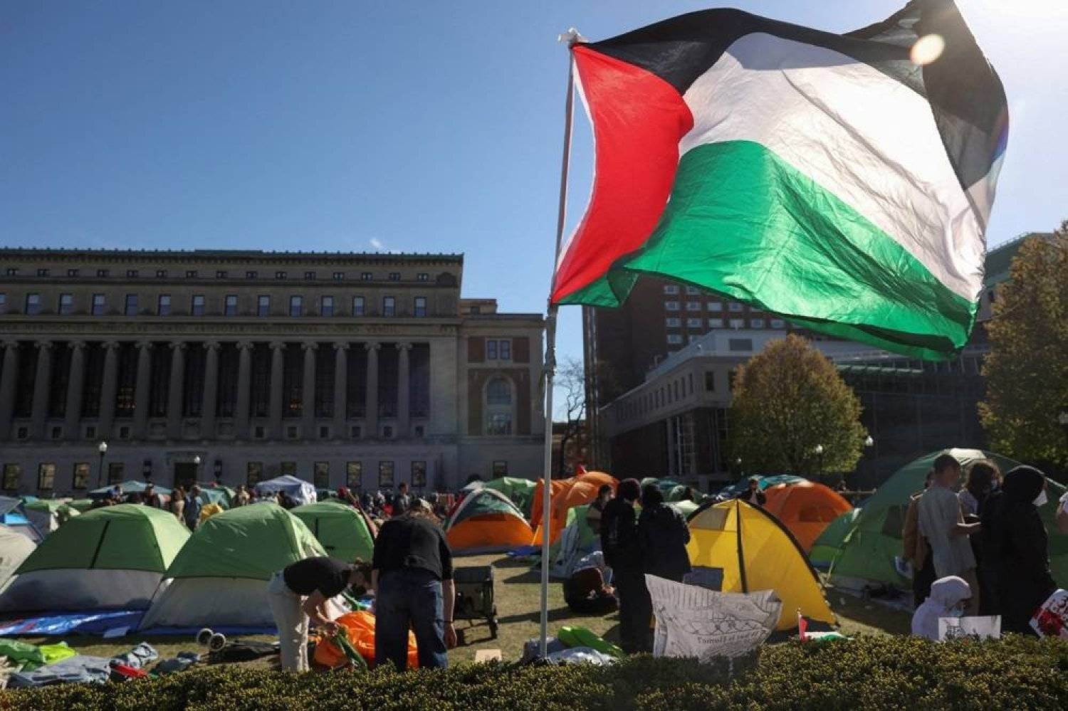 Students continue to protest at an encampment supporting Palestinians on the Columbia University campus, during the ongoing conflict between Israel and the Palestinian group Hamas, in New York City, US, April 25, 2024. (Reuters)
