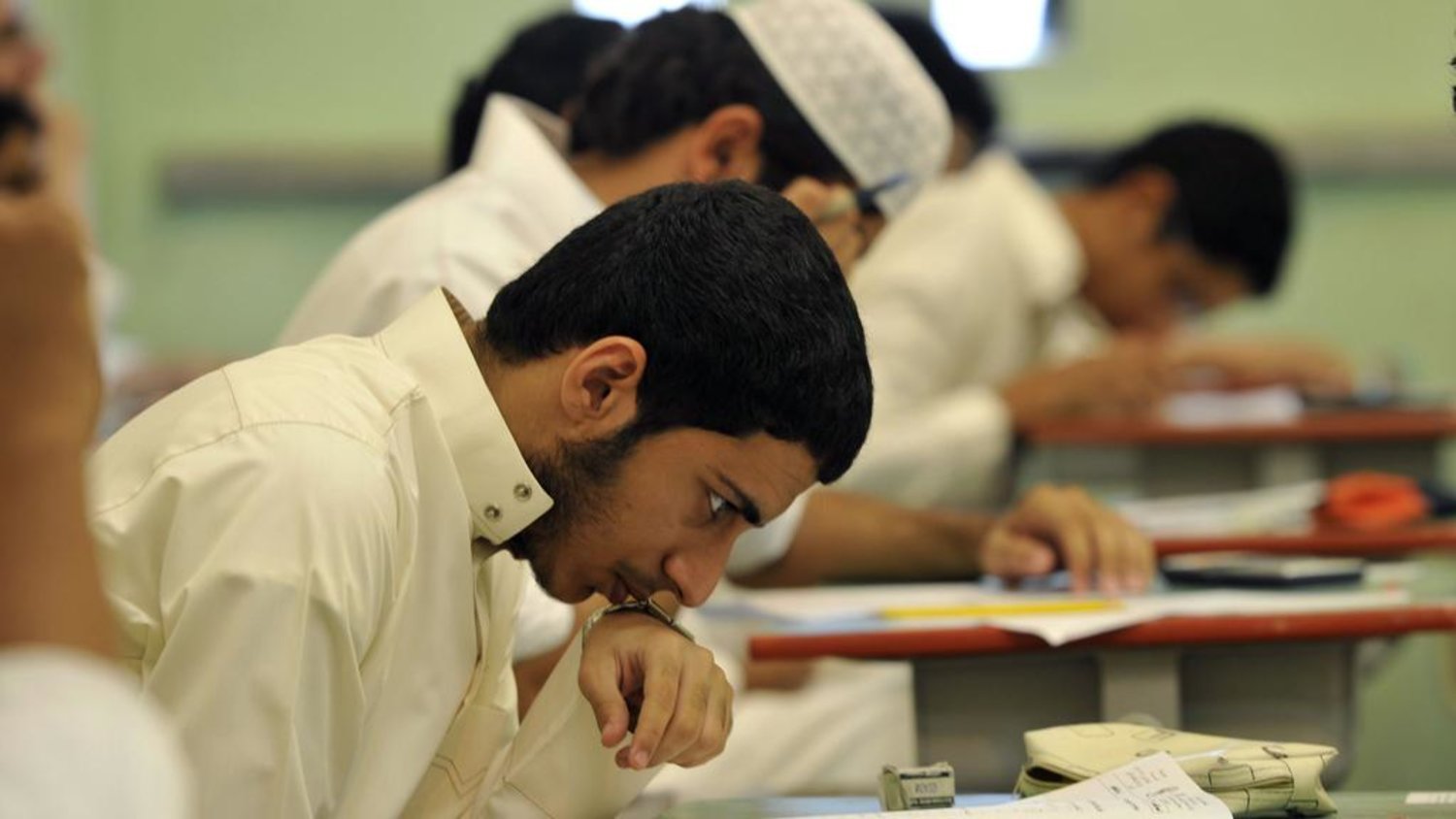 Saudi students sit for their final high school exams in the Red Sea port city of Jeddah on June 19, 2010. (AFP)
