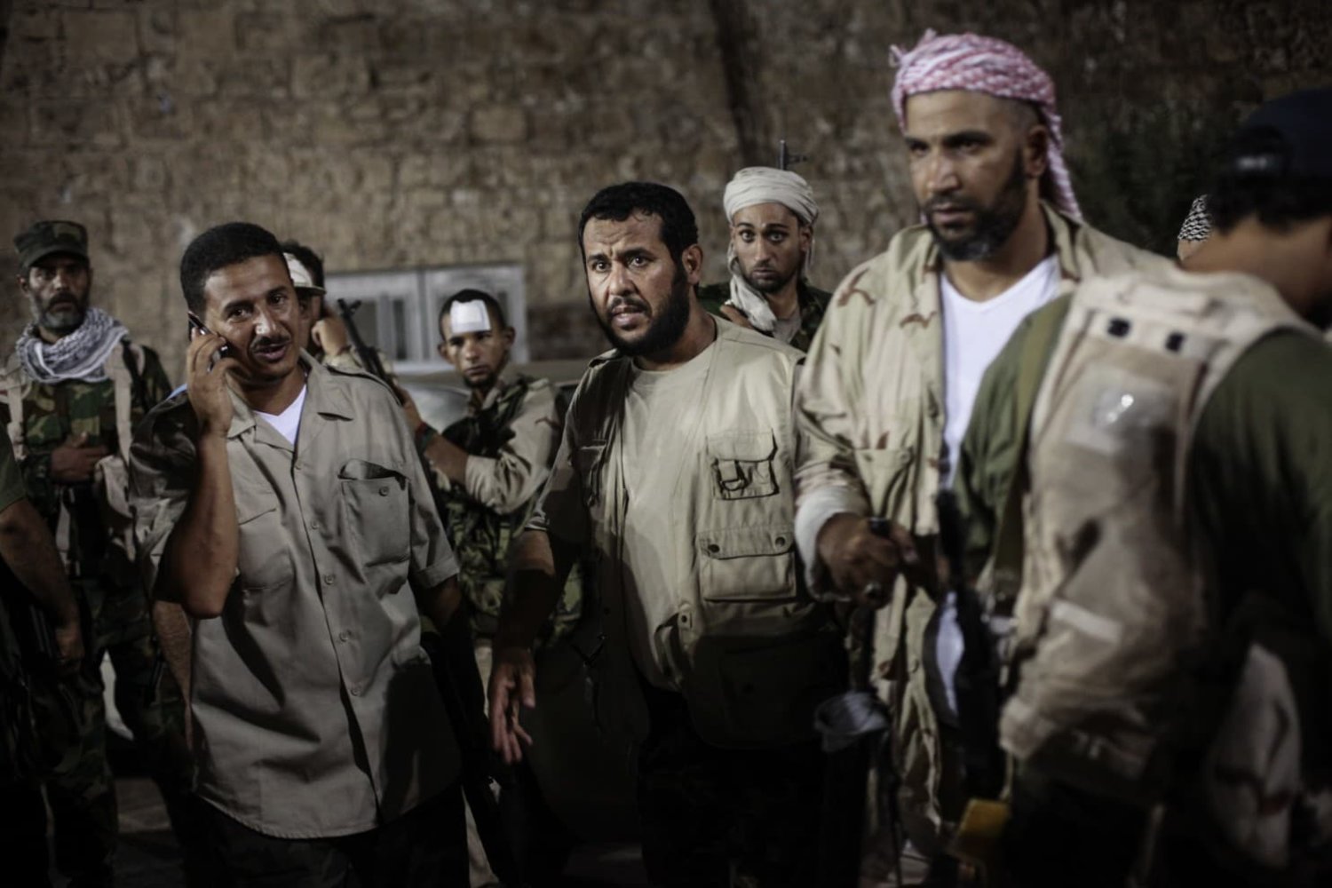 Abdulhakim Belhadj, center, gives instructions to his troops in Tripoli, Libya’s capital, on Aug. 22, 2011. (Etienne De Malglaive/Getty Images) 