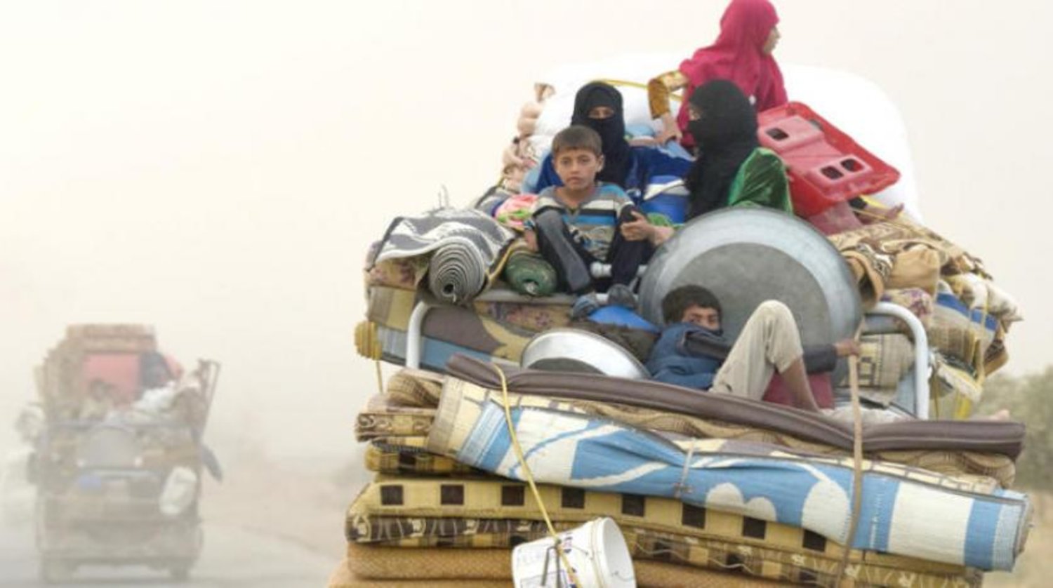 Syrians escape battles in Deir el-Zor and head towards Raqqa suburbs, AFP 