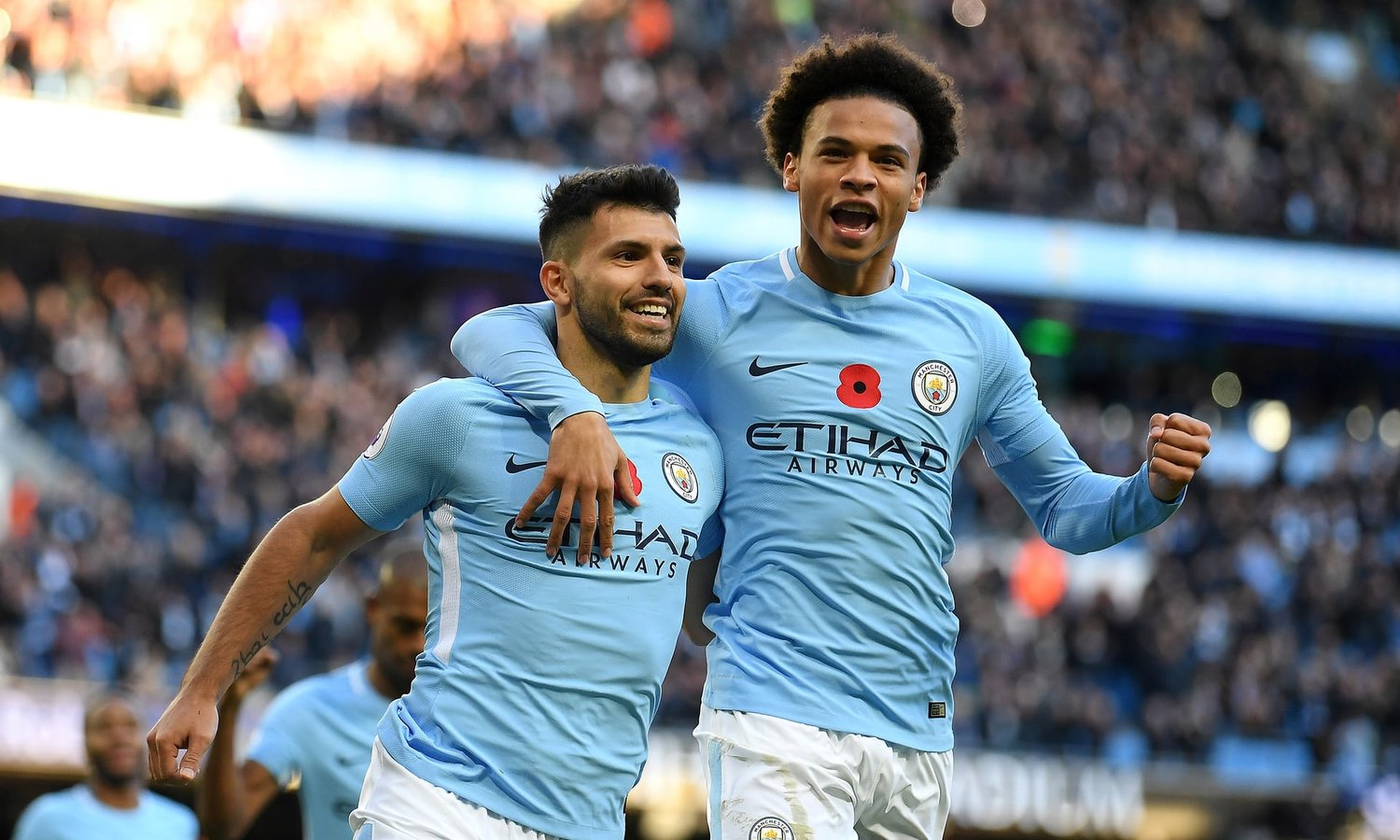 Sergio Agüero, left, and Leroy Sané have helped Manchester City open an eight-point gap at the top of the Premier League by winning 10 of their first 11 games. Photograph: Laurence Griffiths/Getty Images
