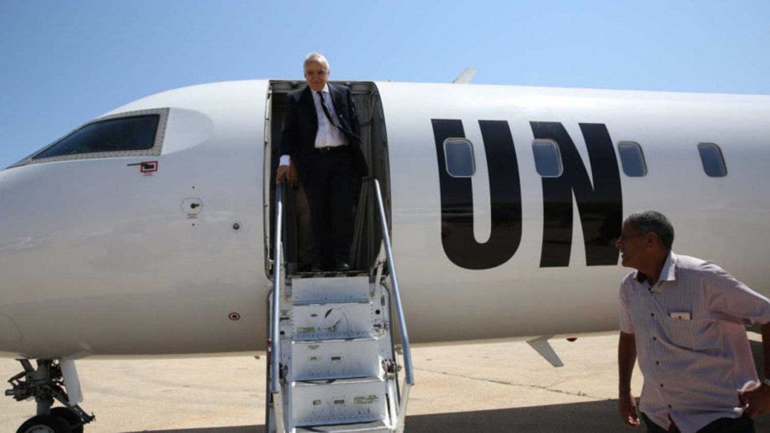 Ghassan Salamé, Special Representative of the Secretary-General (SRSG) and Head of the United Nations Support Mission in Libya disembarks from the UN plane in Al-Qubbah, 6 August, on his first trip to Libya since taking office.Source: UN
