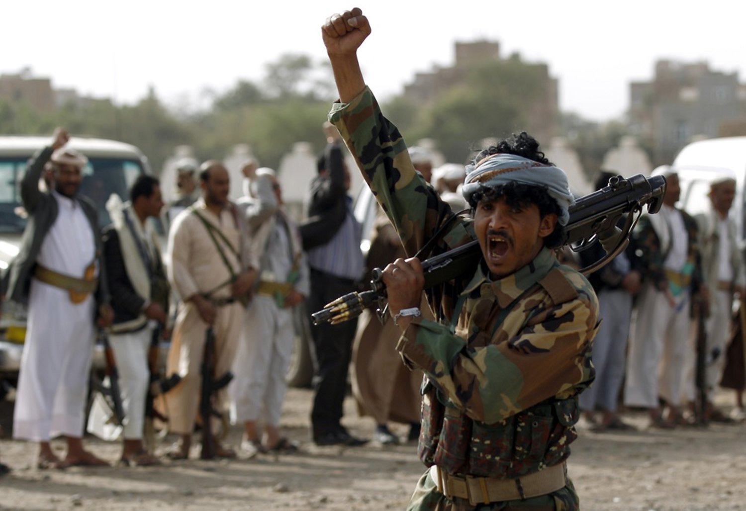 Houthi rebels shout slogans during a rally in Yemen’s Sana’a. (AFP)