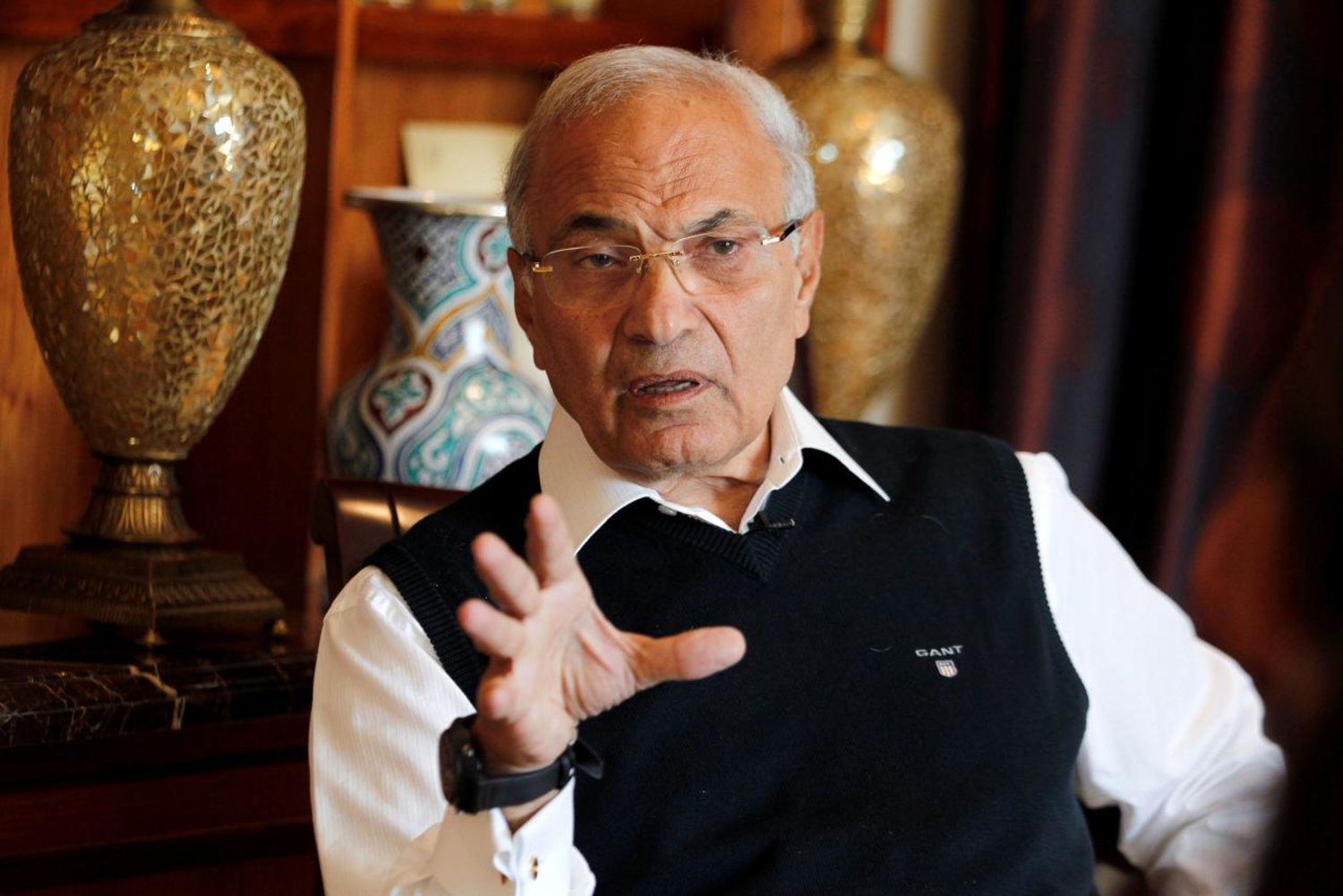 Egypt's former Prime Minister Ahmed Shafik speaks during an interview at his residence in Abu Dhabi February 6, 2013. (Reuters)