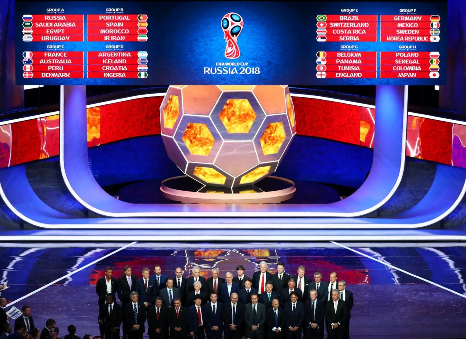 The nations coaches pose for a photo after the 2018 FIFA World Cup draw on December 1. (Reuters)