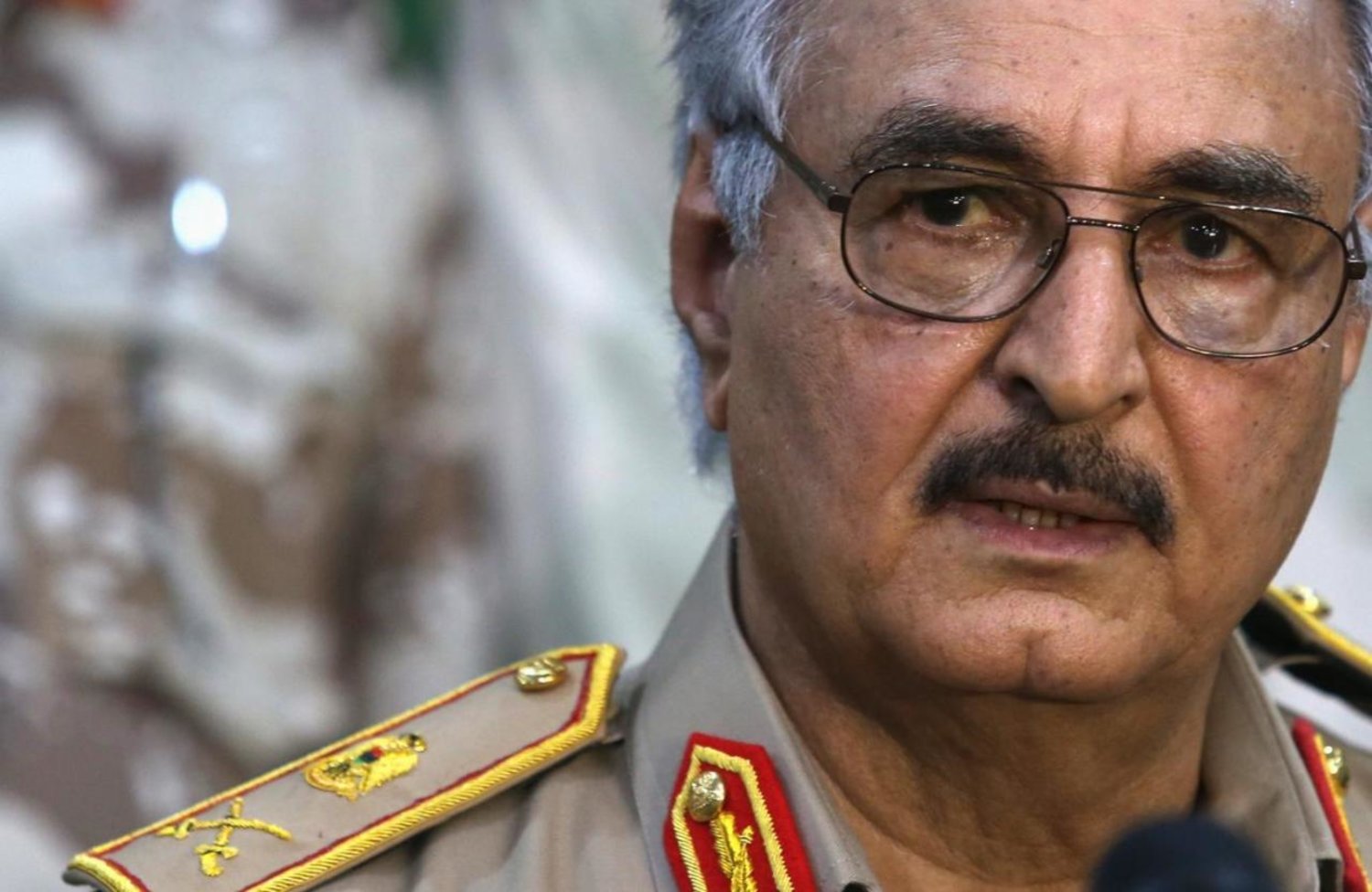 Then-General Khalifa Haftar speaks during a news conference at a sports club in Abyar, east of Benghazi May 21, 2014. REUTERS/Esam Omran Al-Fetori