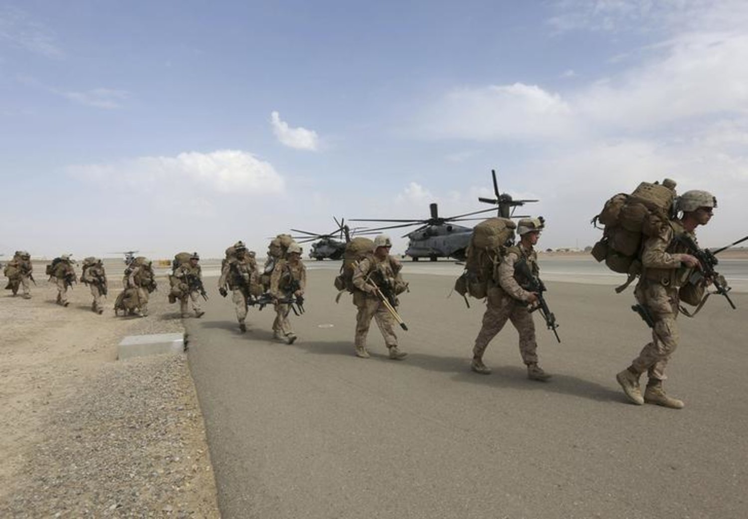 US Marines prepare to depart upon the end of operations for Marines and British combat troops in Helmand October 27, 2014. REUTERS/Omar Sobhani/Files