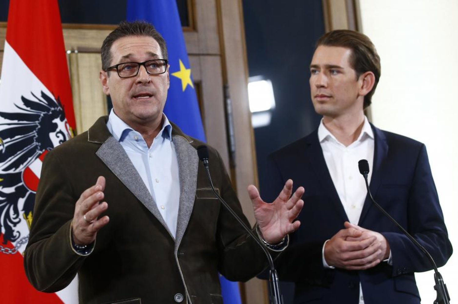 Head of the Freedom Party Heinz-Christian Strache (L) and head of the People's Party Sebastian Kurz address a news conference in Vienna, Austria, December 15, 2017. (Reuters)