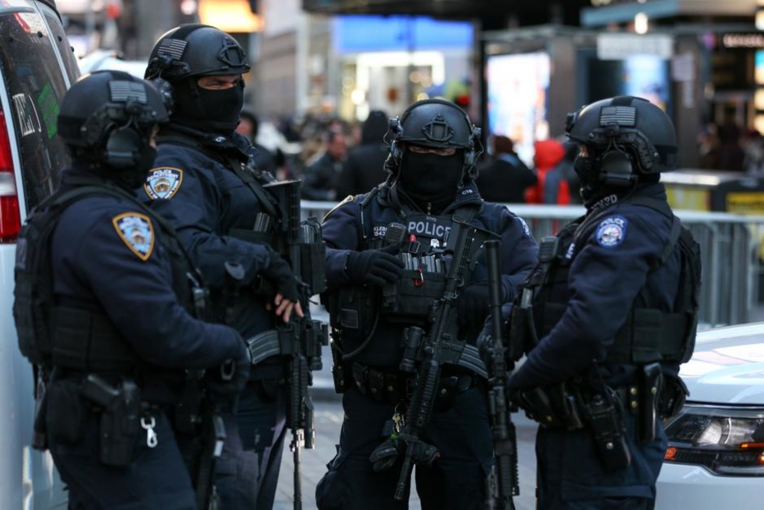 New York Police Department Counterterrorism Bureau members stand in Times Square to provide security ahead of New Year's Eve celebrations in Manhattan, New York, U.S. December 28, 2017. REUTERS/Amr Alfiky