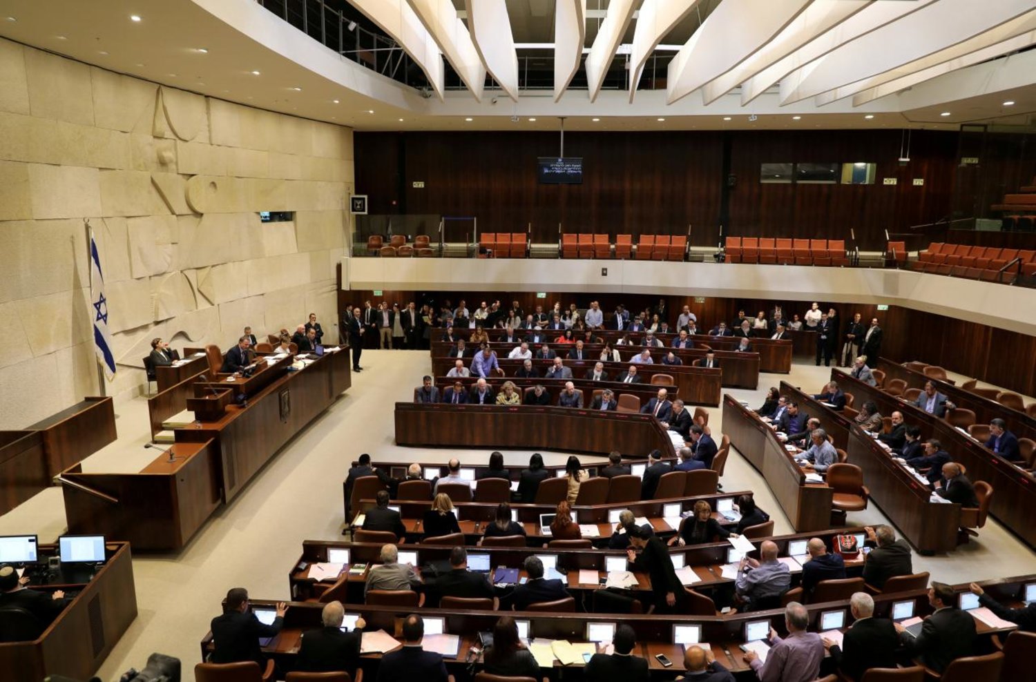 Israeli lawmakers attend a vote on a bill at the Knesset, the Israeli parliament, in Jerusalem. Reuters