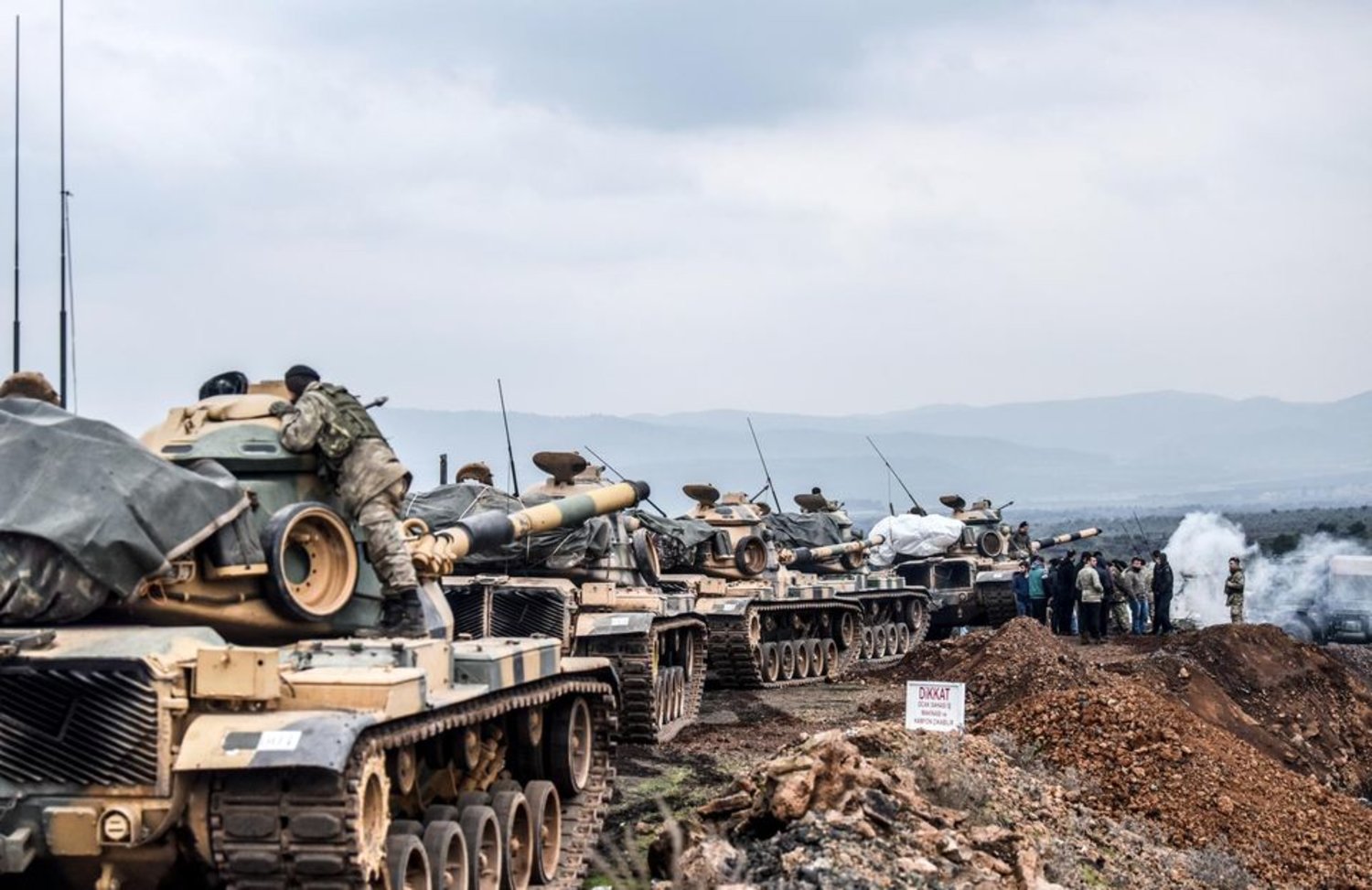 Turkish troops gather near the Syrian border at Hassa, in Hatay province on January 21, 2018. (AFP)