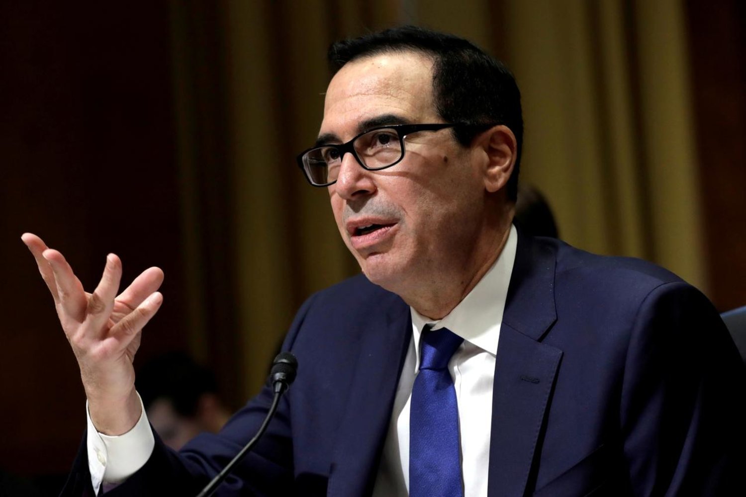 FILE PHOTO: US Treasury Secretary Steven Mnuchin testifies before the Senate Finance Committee during a hearing on the President's FY2021 Budget on Capitol Hill in Washington, US, February 12, 2020. REUTERS/Yuri Gripas/File Photo/File Photo