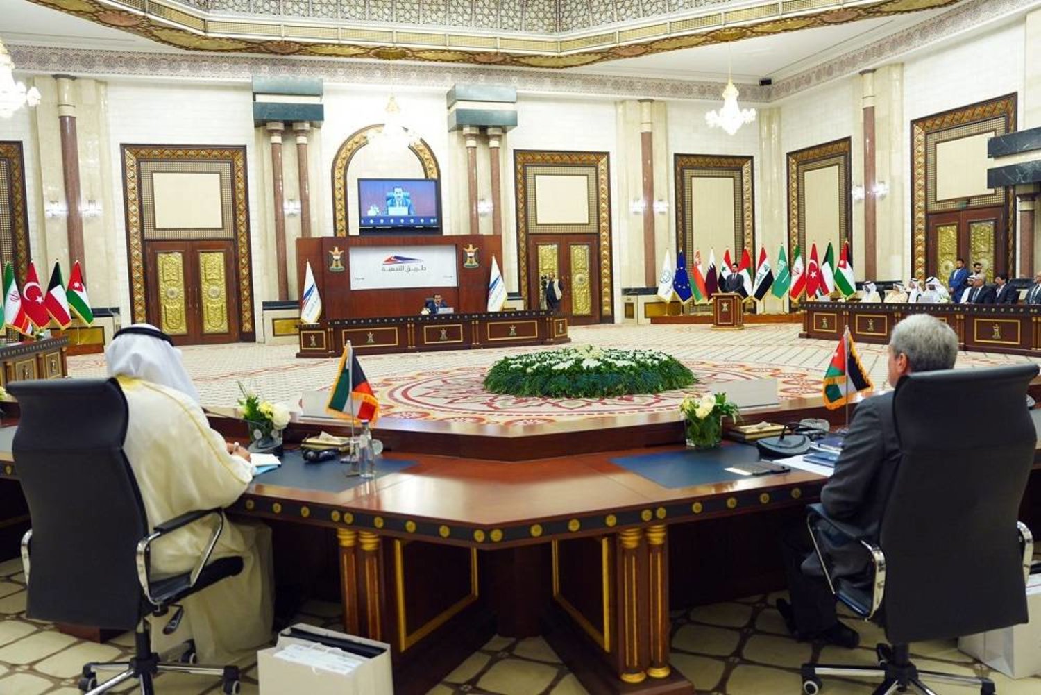 A handout picture released by Iraq's Prime Minister's Media Office shows Iraqi Prime Minister Mohammed Shia al-Sudani attending a meeting with transport ministry representatives in Baghdad on May 27, 2023. (Iraqi Prime Minister’s Press Office/AFP) 