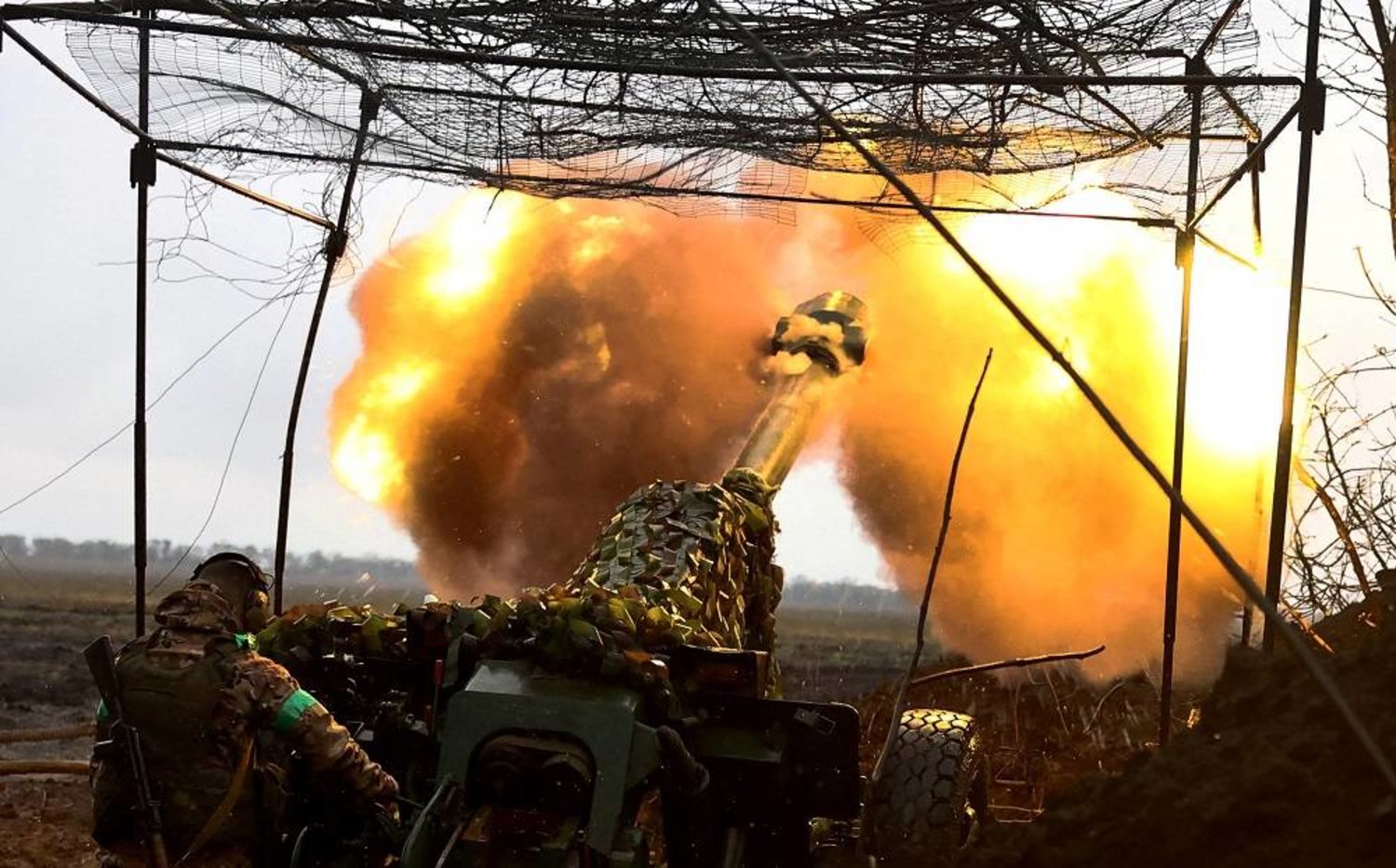Ukrainian artillery fires towards the frontline during heavy fighting amid Russia's attack on Ukraine, near Bakhmut, Ukraine, April 13, 2023. (Reuters)