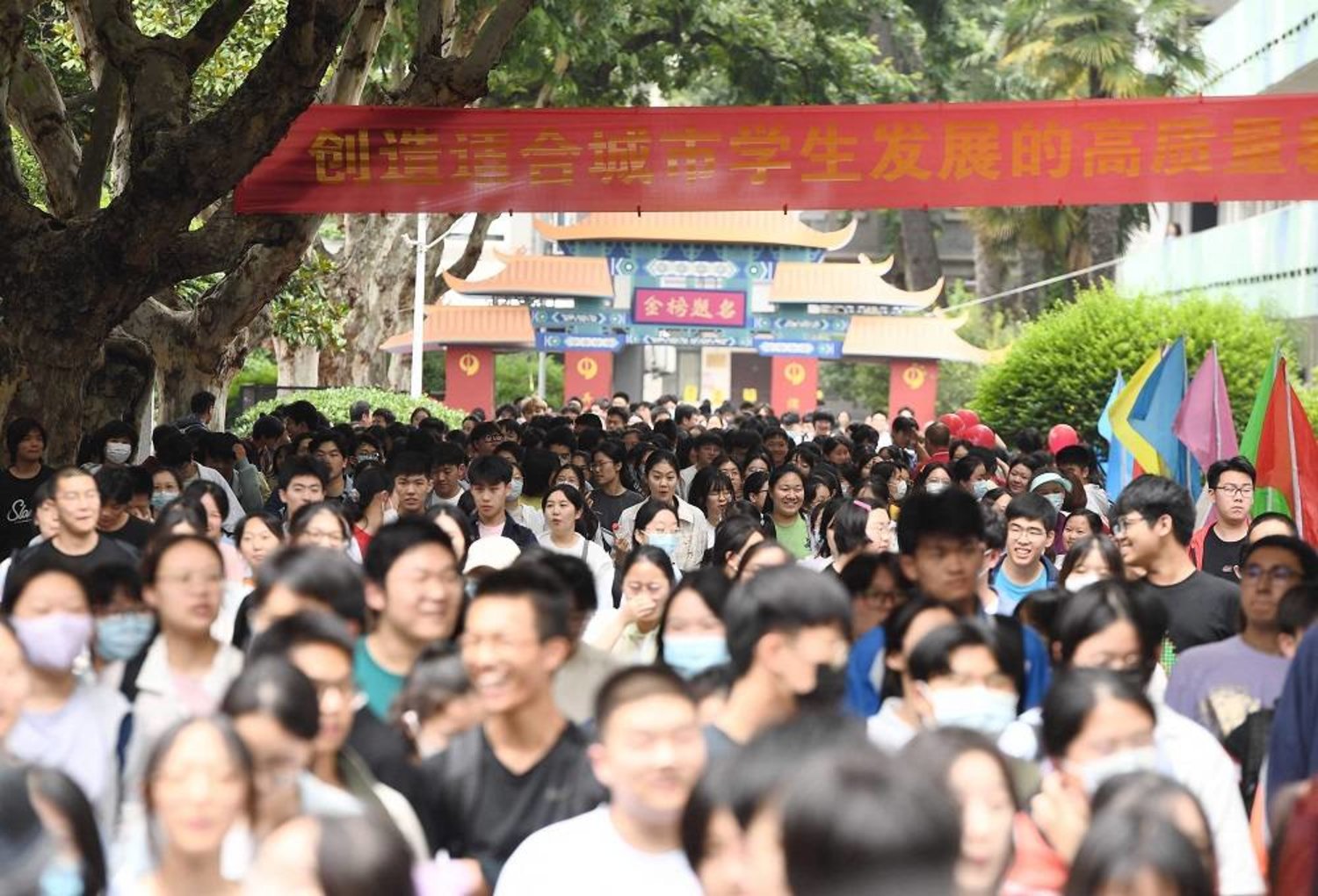 Students leave after their first exam during the first day of the National College Entrance Examination (NCEE), known as “gaokao”, in Nanjing, in China's eastern Jiangsu province on June 7, 2023. (AFP) 