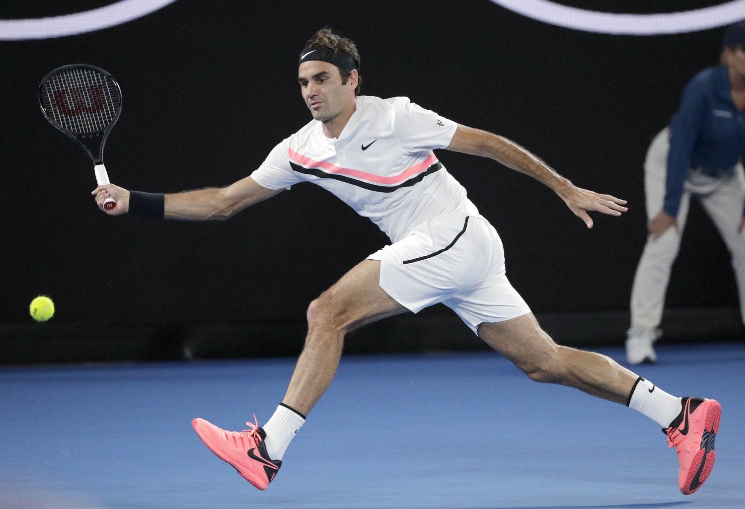 FILE - Switzerland's Roger Federer hits a forehand to Croatia's Marin Cilic during the men's singles final at the Australian Open tennis championships in Melbourne, Australia, on Jan. 28, 2018. (AP Photo/Dita Alangkara, File)