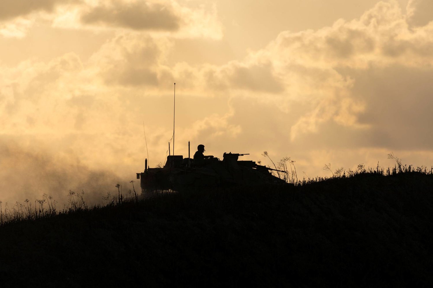 An Israeli tank is positioned near the border between Israel and the Gaza Strip during clashes between Palestinian protesters and Israeli soldiers, as it is seen from the Israeli side September 20, 2023. REUTERS/Amir Cohen
