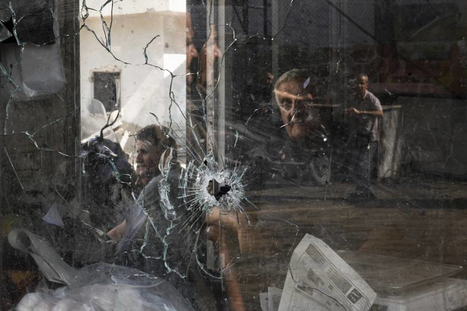 A bullet hole is seen in a shop window following an Israeli military raid in the Jenin refugee camp, West Bank, Wednesday, Sept. 20, 2023. (AP)