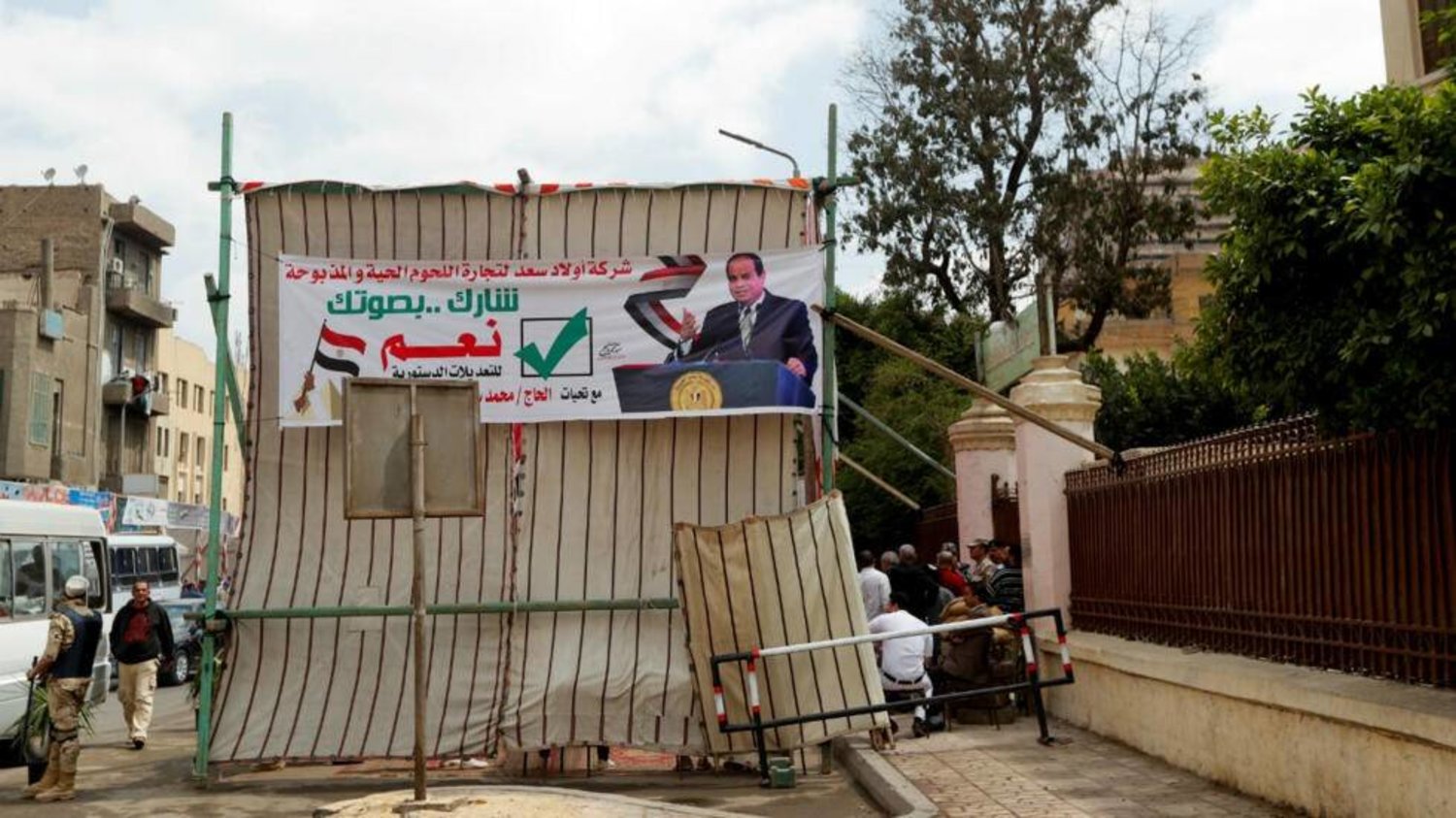 A banner depicting Egyptian President Abdel Fattah al-Sisi is seen outside a polling station during the referendum on draft constitutional amendments (File photo: Reuters)