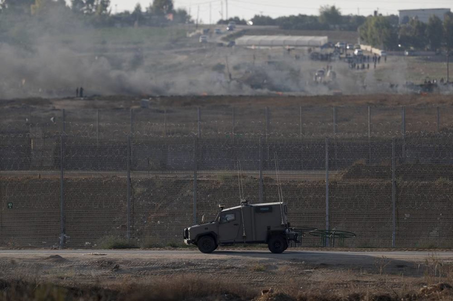 Israeli army vehicle patrols at the border with the Gaza Strip during clashes between Palestinian protesters and the Israeli troops near Nahal Oz, on the border with Gaza Strip, 22 September 2023. (EPA)