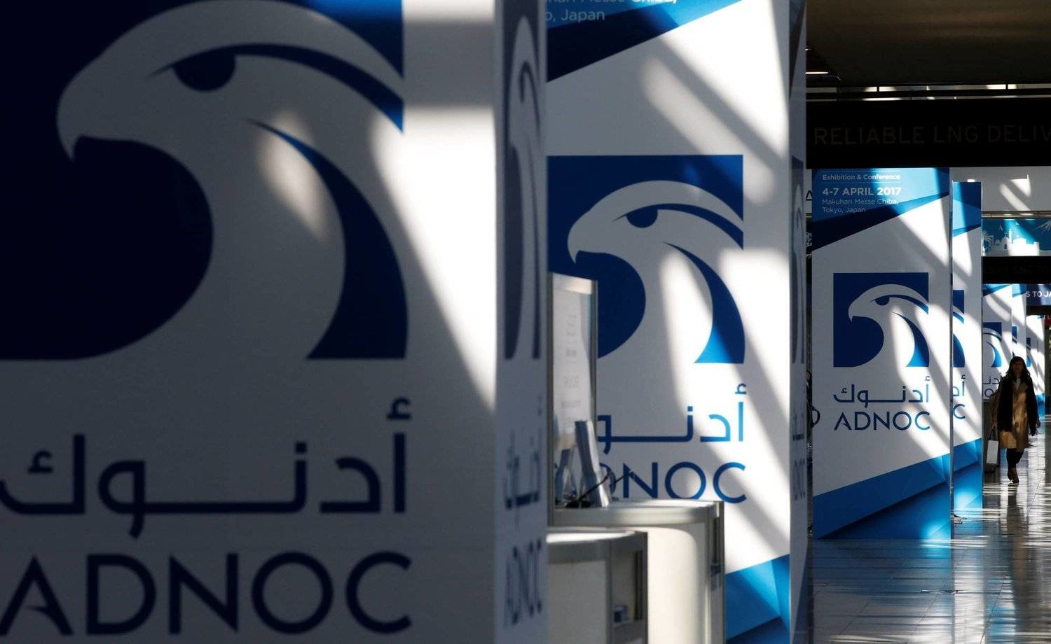 Logos of ADNOC are seen at Gastech, the world's biggest expo for the gas industry, in Chiba, Japan, April 4, 2017. REUTERS/Toru Hanai