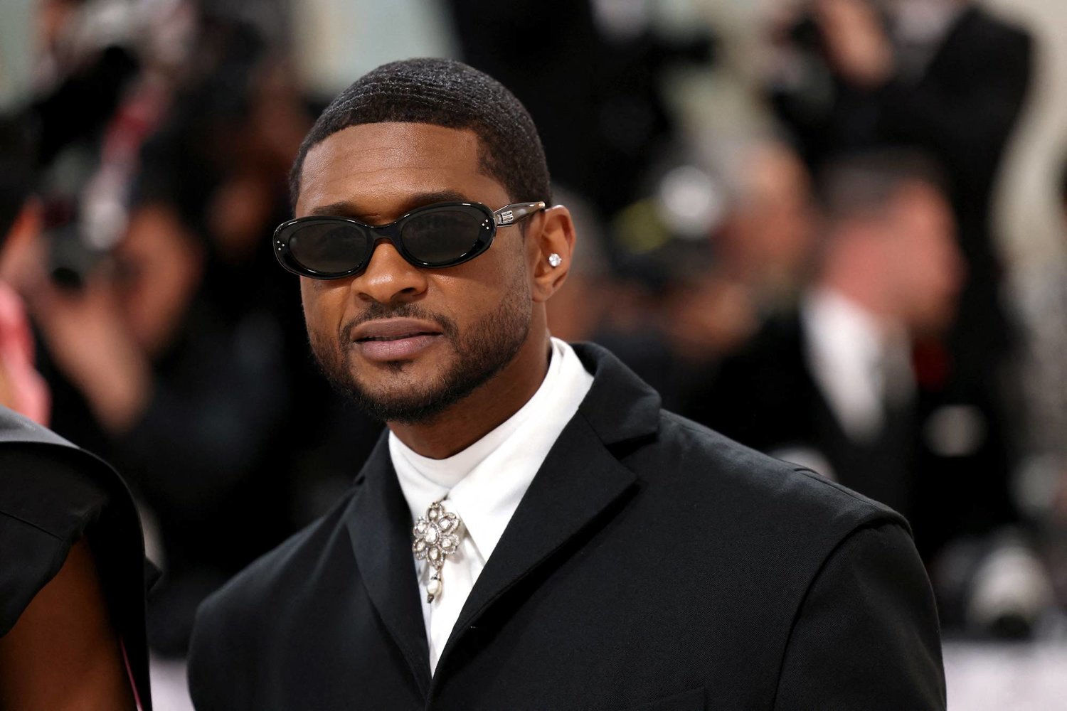 FILE PHOTO: Usher poses at the Met Gala in New York City, New York, US, May 1, 2023. REUTERS/Andrew Kelly/File Photo
