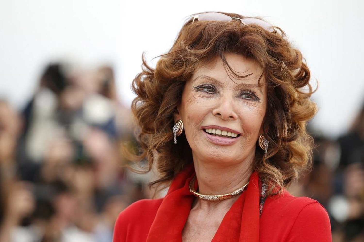 Italian actress Sophia Loren smiles during a photo call for "Human Voice," (Voce Umana) at the 67th international film festival, Cannes, southern France, on May 21, 2014. (AP)