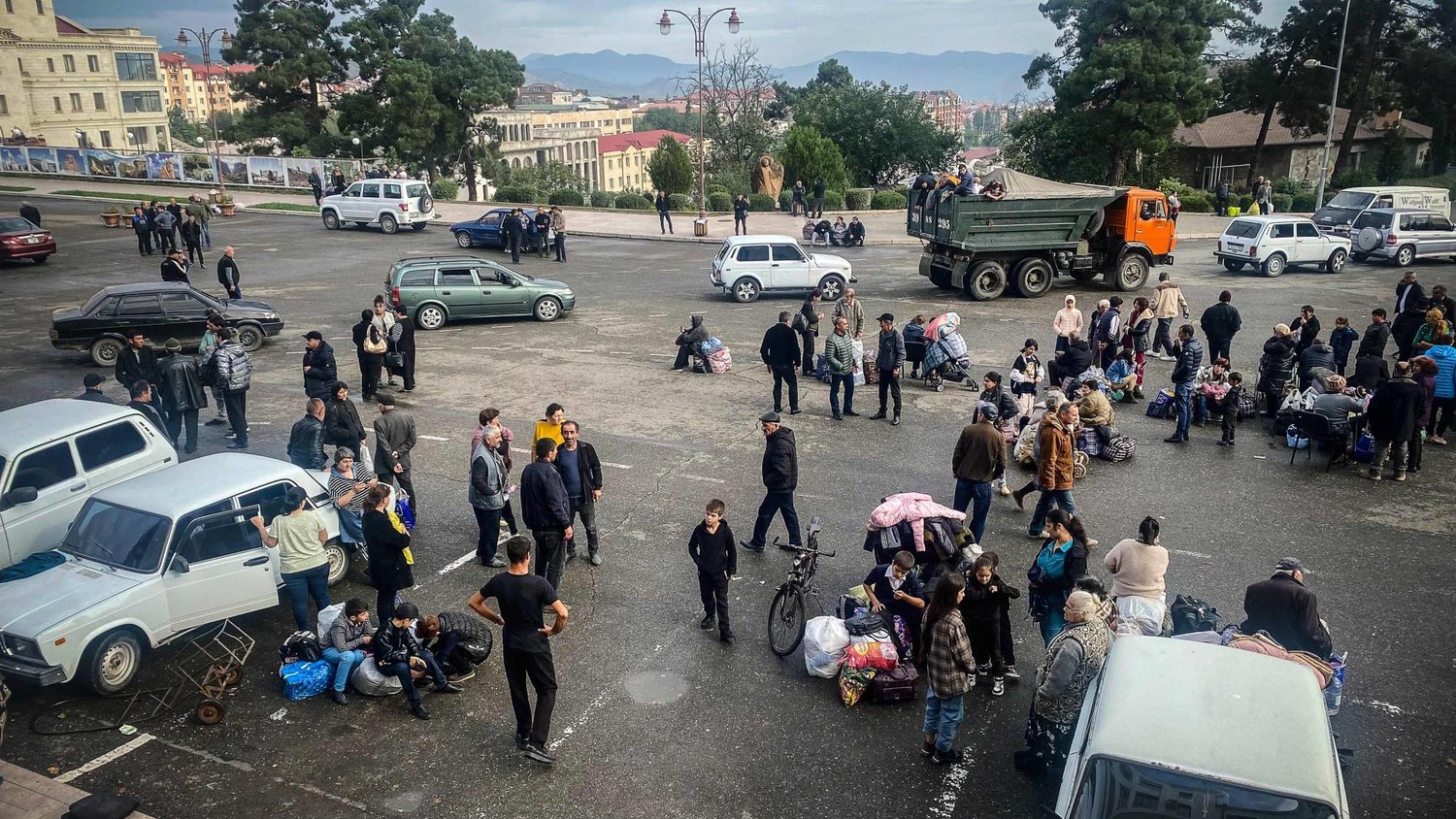 Ethnic Armenians wait to be evacuated from Stepanakert on September 26, 2023. (Photo by Siranush Sargsyan / AFP)