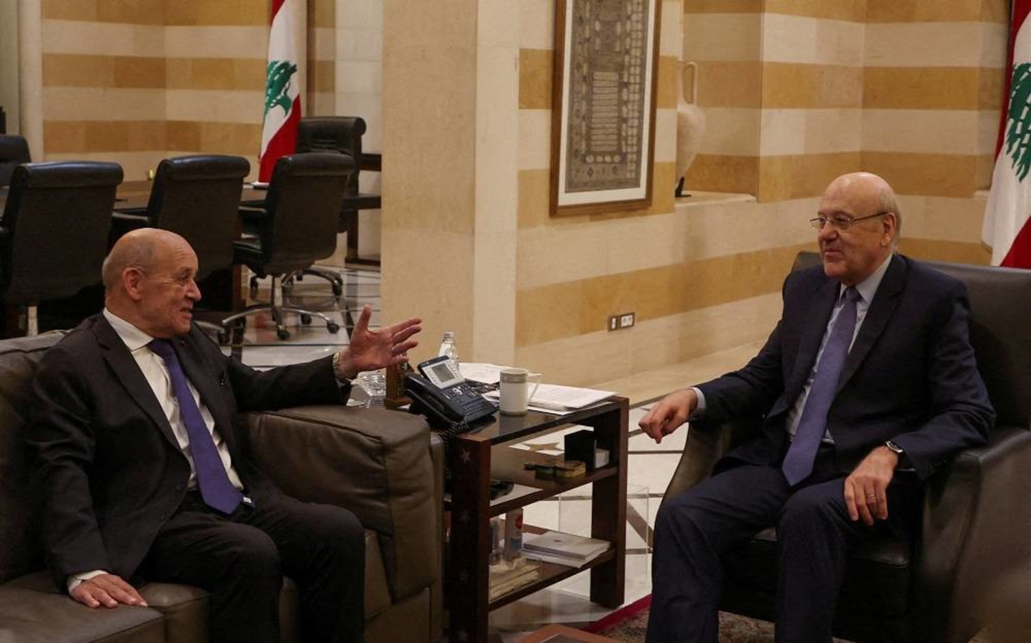 Lebanon's caretaker Prime Minister Najib Mikati meets with former French Foreign Minister Jean-Yves Le Drian in Beirut, Lebanon June 22, 2023. (Reuters)