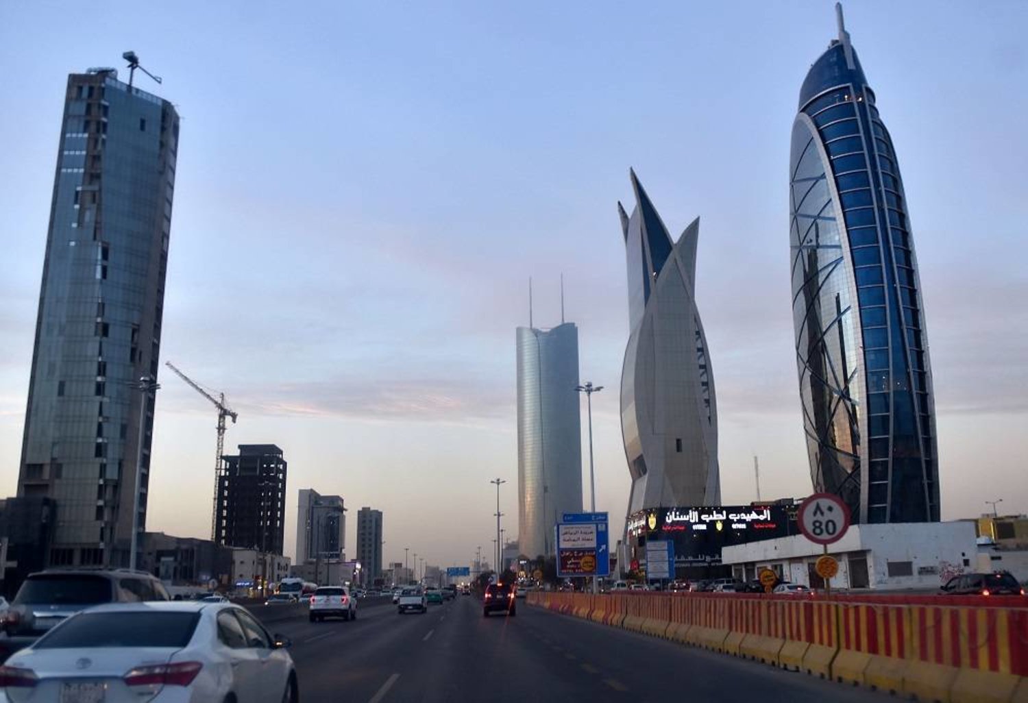 Riyadh Skyscrapers tower over a highway in the main financial hub, Riyadh, Saudi Arabia, Dec. 16, 2020. (AFP)