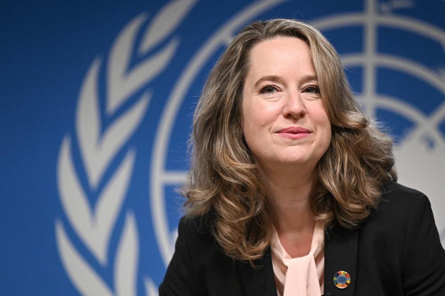 New Director General of the International Organization for Migration (IOM) Amy Pope attends a press conference at the United Office in Geneva, on October 2, 2023. (AFP)