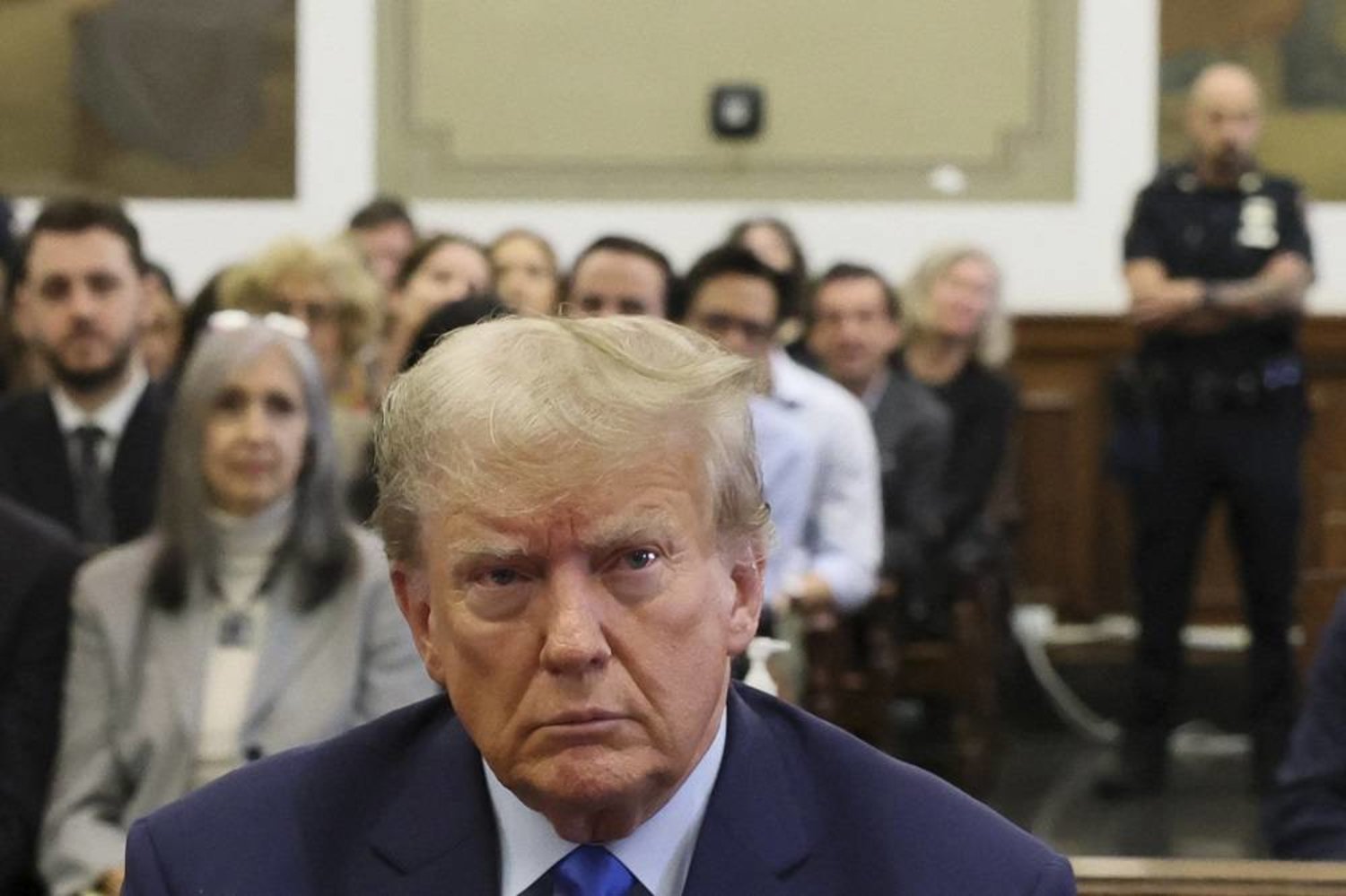 Former US President Donald Trump attends the trial of himself, his adult sons, the Trump Organization and others in a civil fraud case brought by state Attorney General Letitia James, at a Manhattan courthouse, in New York City, on October 2, 2023. (AFP)