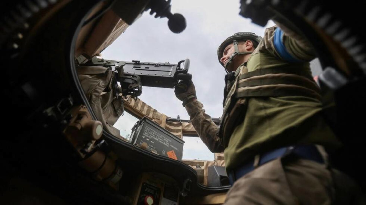 A Ukrainian serviceman mans a machine gun in an MRAP armored vehicle on June 16, 2023. Anatolii Stepanov / AFP/File
