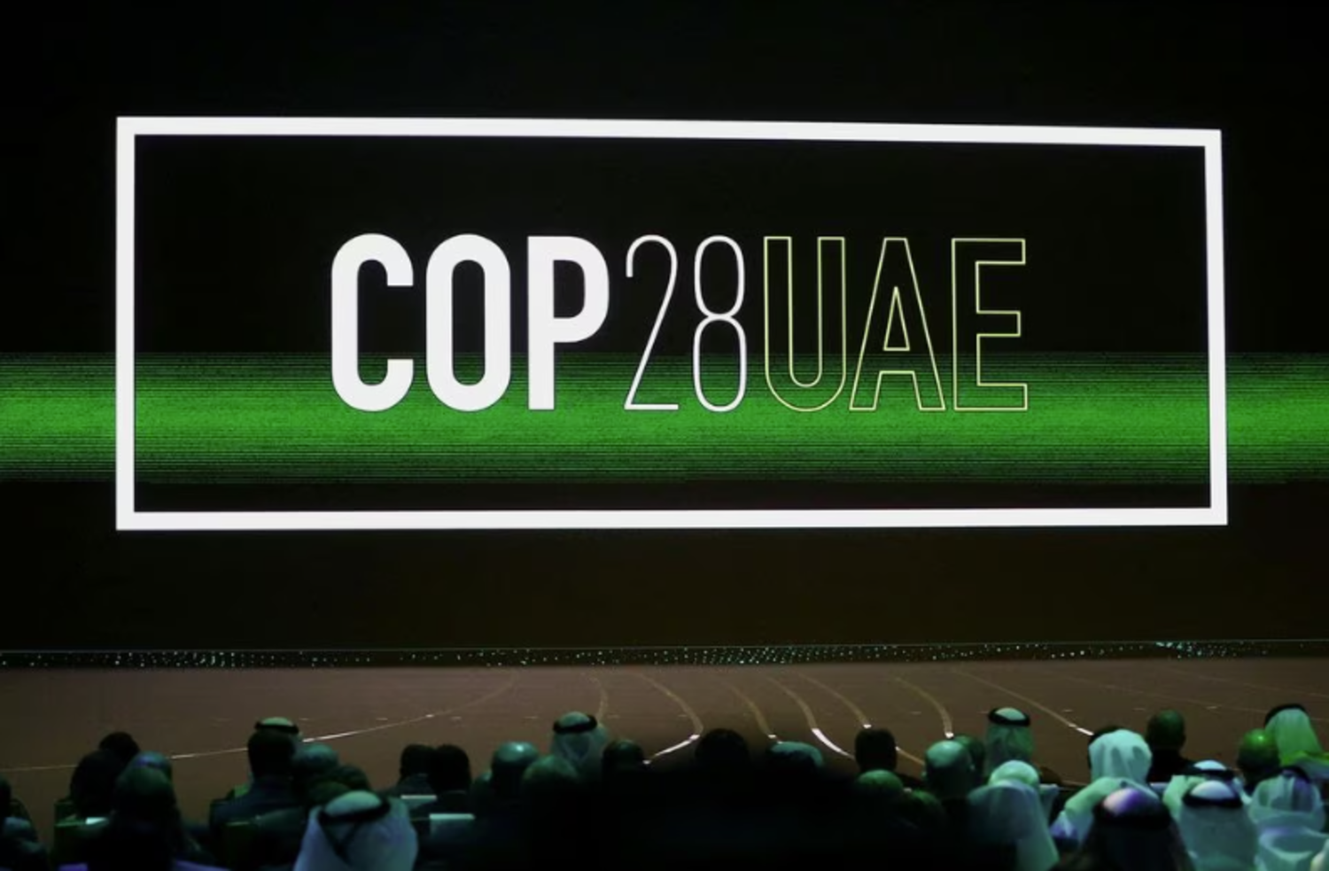 'Cop28 UAE' logo is displayed on the screen during the opening ceremony of Abu Dhabi Sustainability Week (ADSW) under the theme of 'United on Climate Action Toward COP28', in Abu Dhabi, UAE, January 16, 2023. REUTERS/Rula Rouhana  
