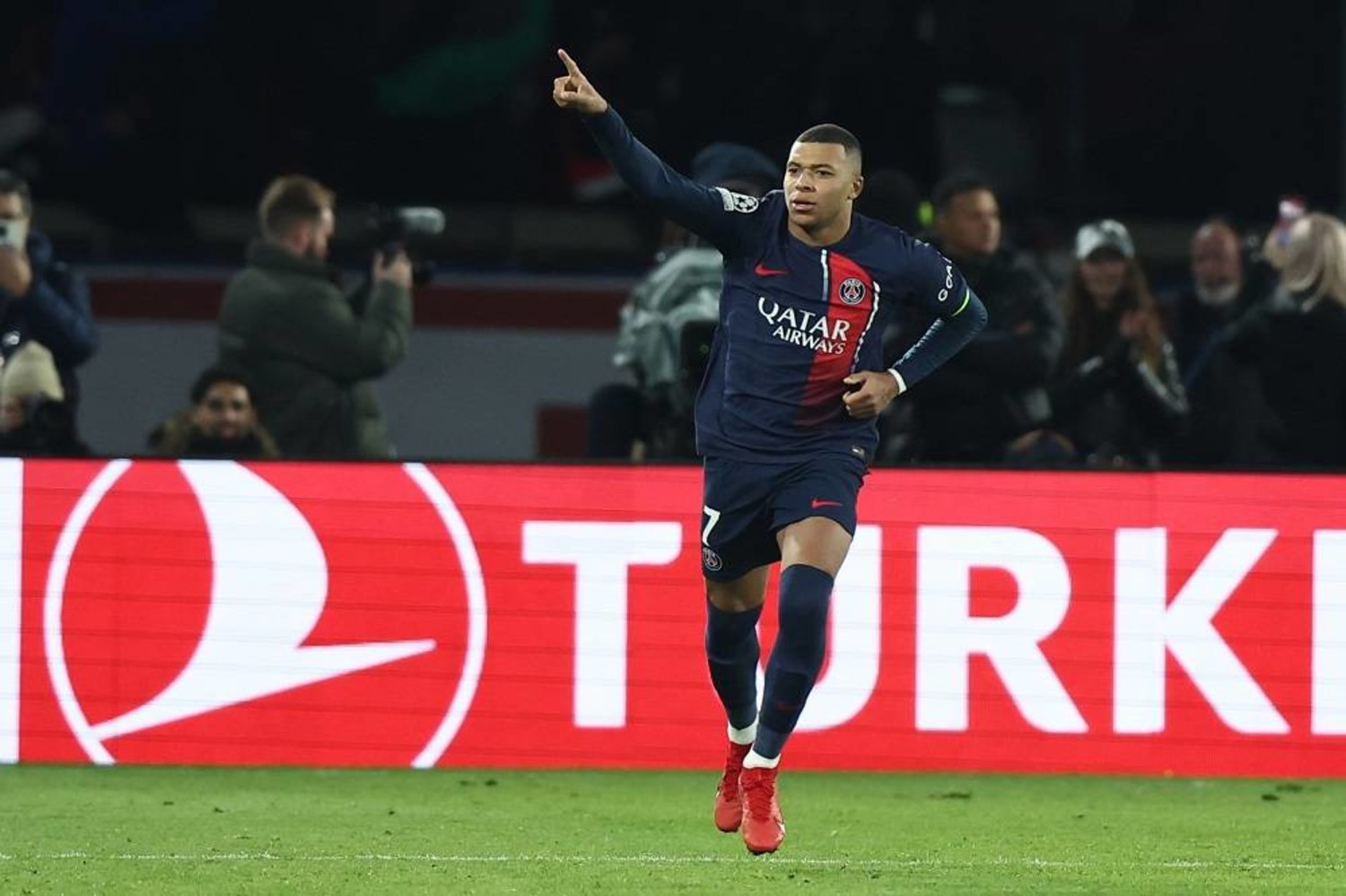 Kylian Mbappé of PSG celebrates after scoring the 1-1 goal from the penalty spot during the UEFA Champions League group F match between Paris Saint-Germain and Newcastle United in Paris, France, 28 November 2023. (EPA)