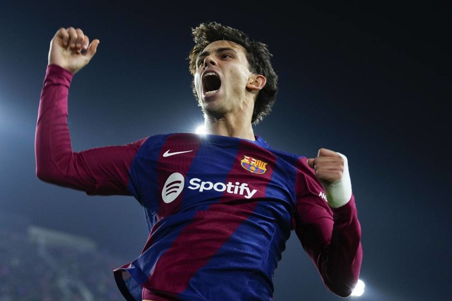 FC Barcelona's striker Joao Felix celebrates after scoring the 2-1 goal during the UEFA Champions League group H soccer match between FC Barcelona and FC Porto, in Barcelona, Spain, 28 November 2023. (EPA)
