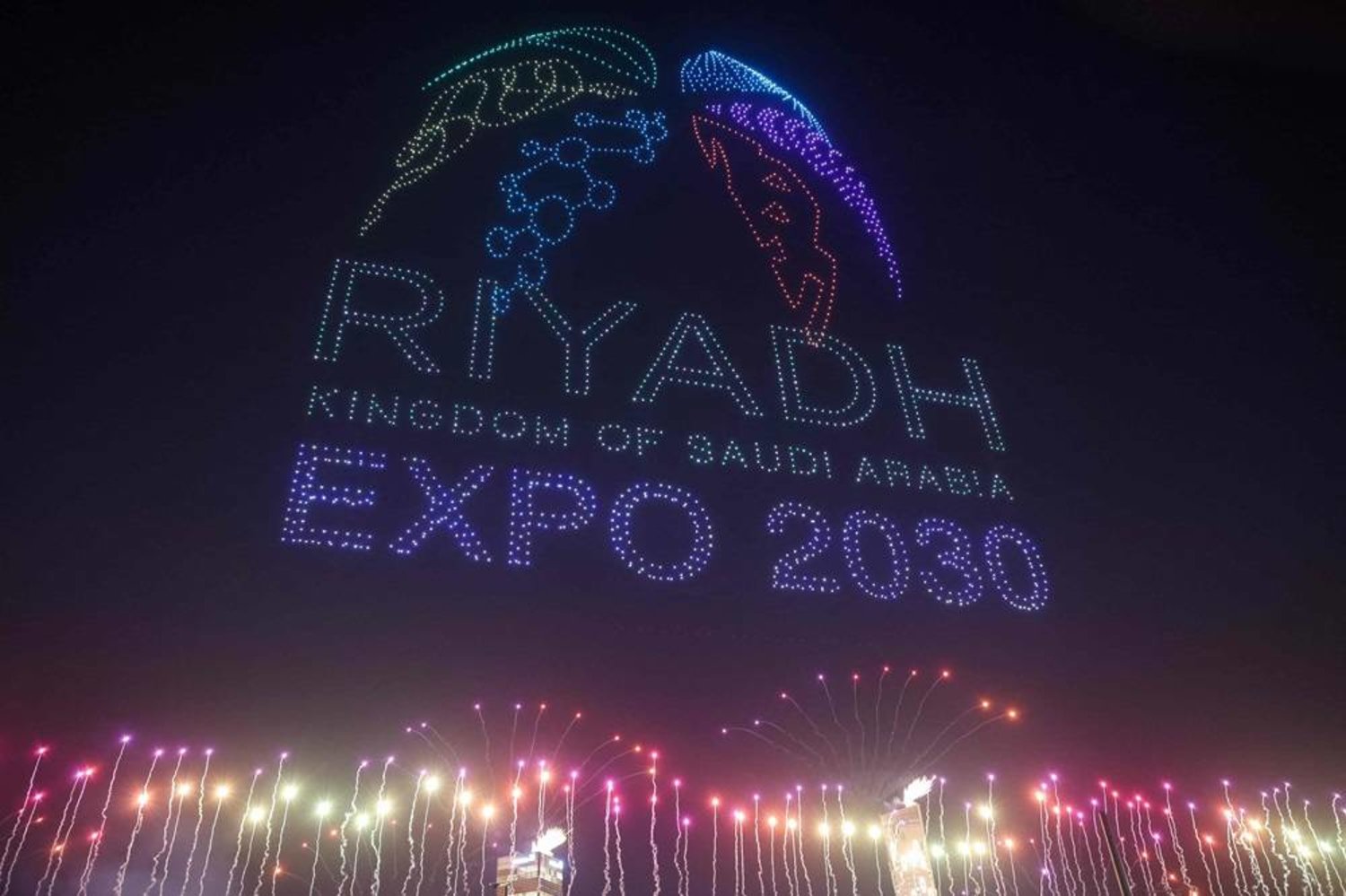 A light display created using drones is performed after Riyadh won the right to host the 2030 World Expo at King Abdullah Financial District in Riyadh, on November 28, 2023. (AFP)