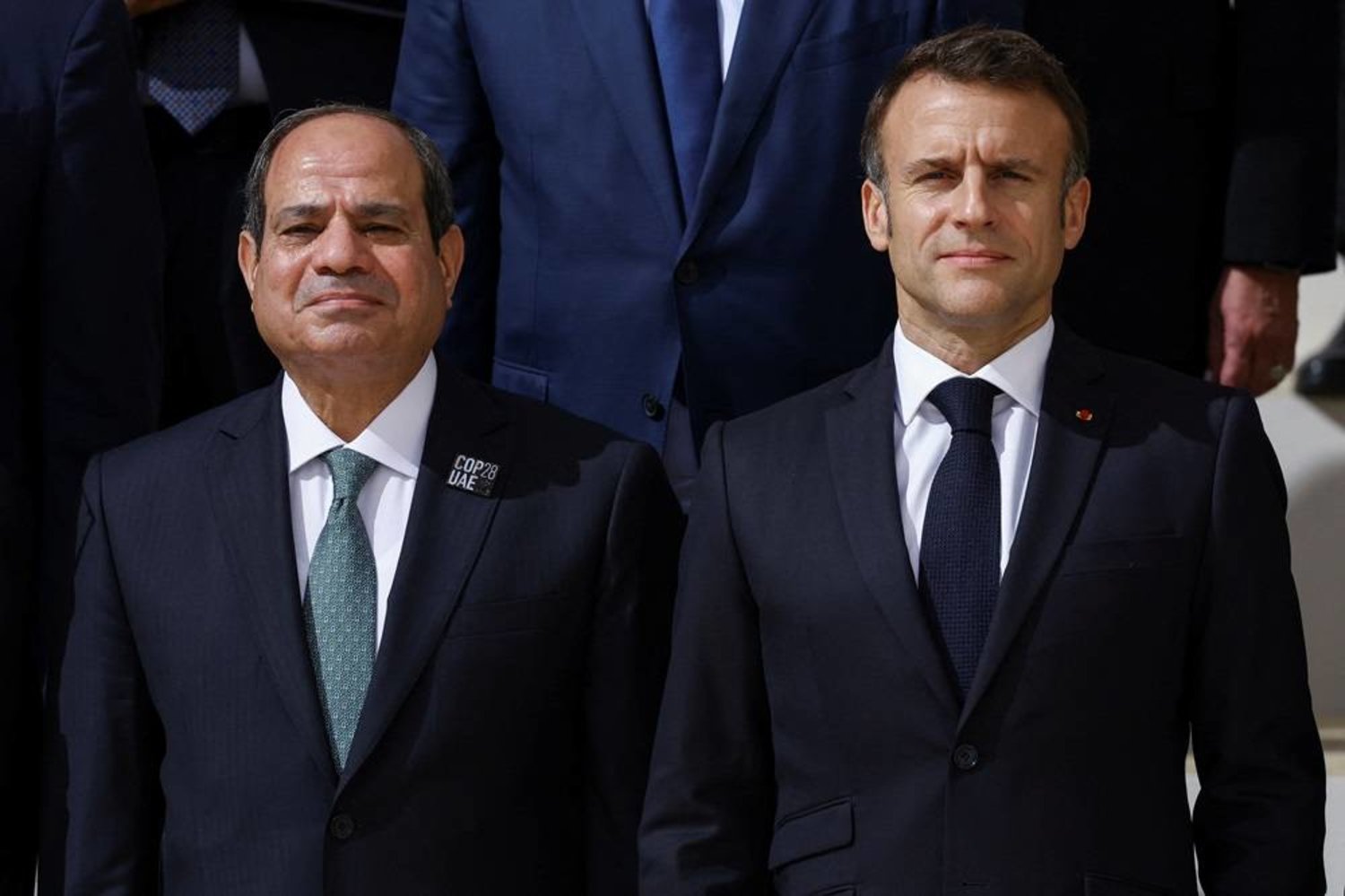  Egyptian President Abdel Fattah al-Sisi and French President Emmanuel Macron pose for a family photo, during the United Nations Climate Change Conference (COP28) in Dubai, United Arab Emirates, December 1, 2023. (Reuters)
