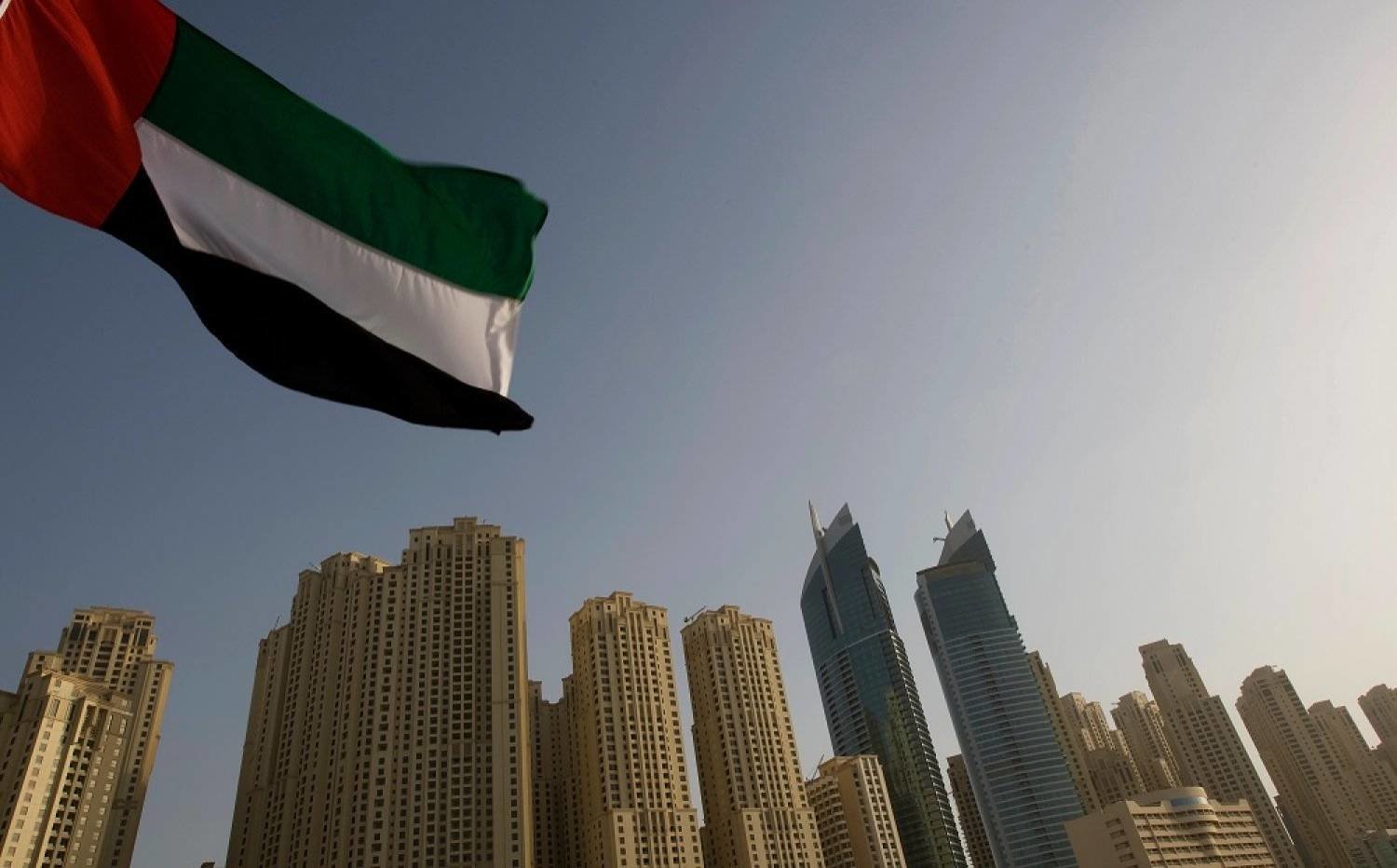  The United Arab Emirates flag flies in front of the Jumeirah Beach Residence in Dubai. (Reuters file photo) 