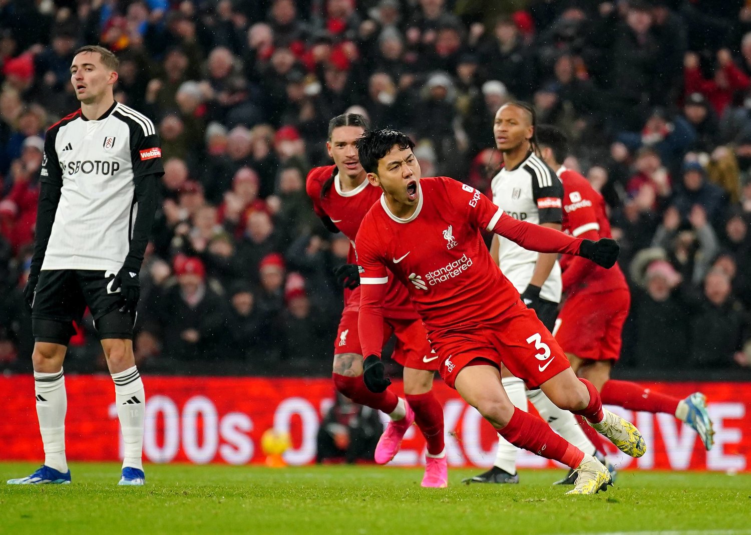 03 December 2023, United Kingdom, Liverpool: Liverpool's Wataru Endo (C) celebrates scoring his sides third goal of the game during the English Premier League soccer match between Liverpool and Fulham at the Anfield. Photo: Peter Byrne/PA Wire/dpa
