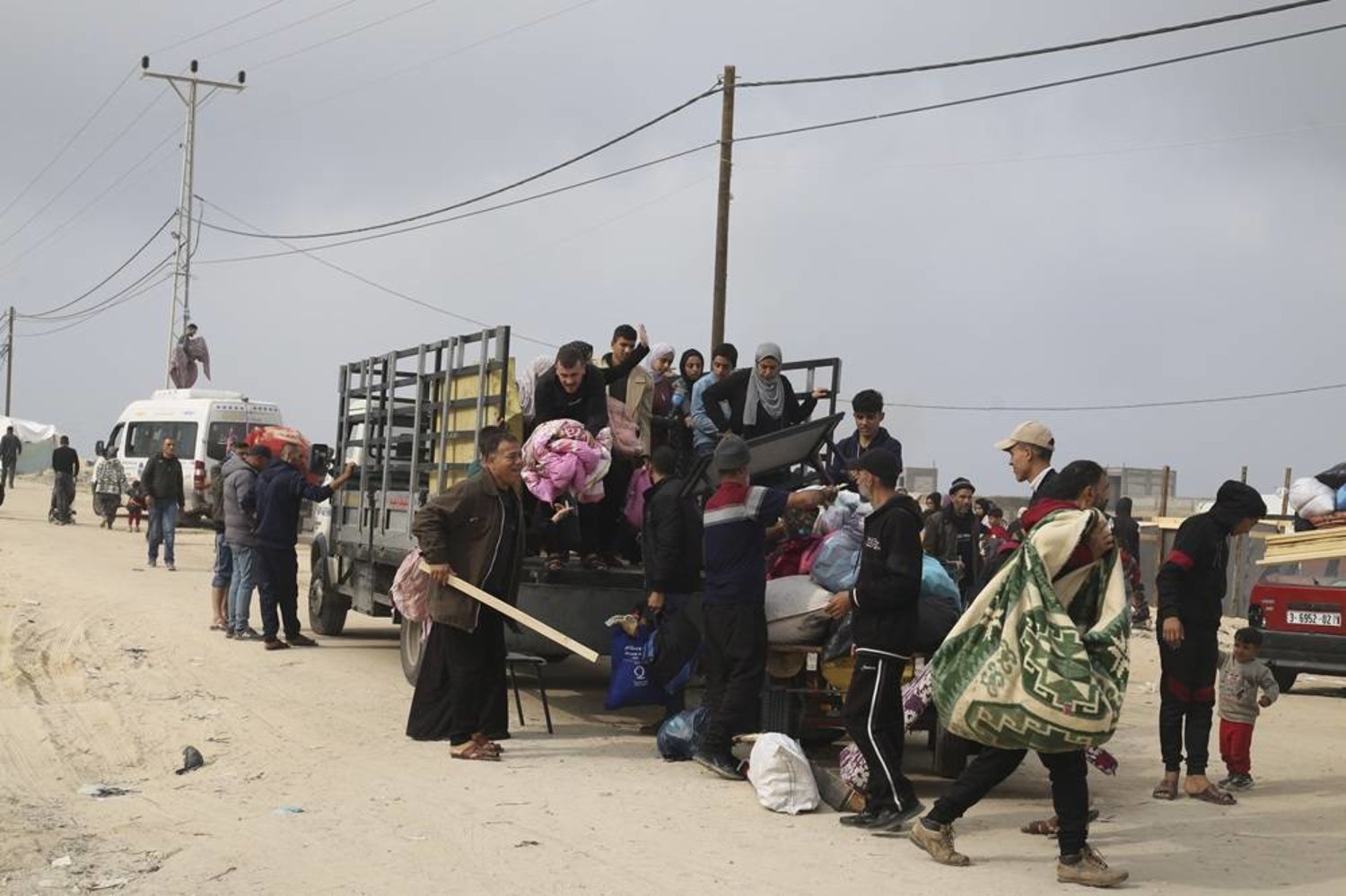 Palestinians fleeing the Israeli ground offensive arrive in Rafah, Gaza Strip, Tuesday, Dec. 5, 2023. (AP)