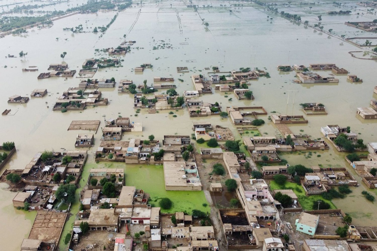 A flooded residential area in Dera Allah Yar after heavy monsoon rains in Jaffarabad district, Balochistan province, Pakistan, last year. (AFP)