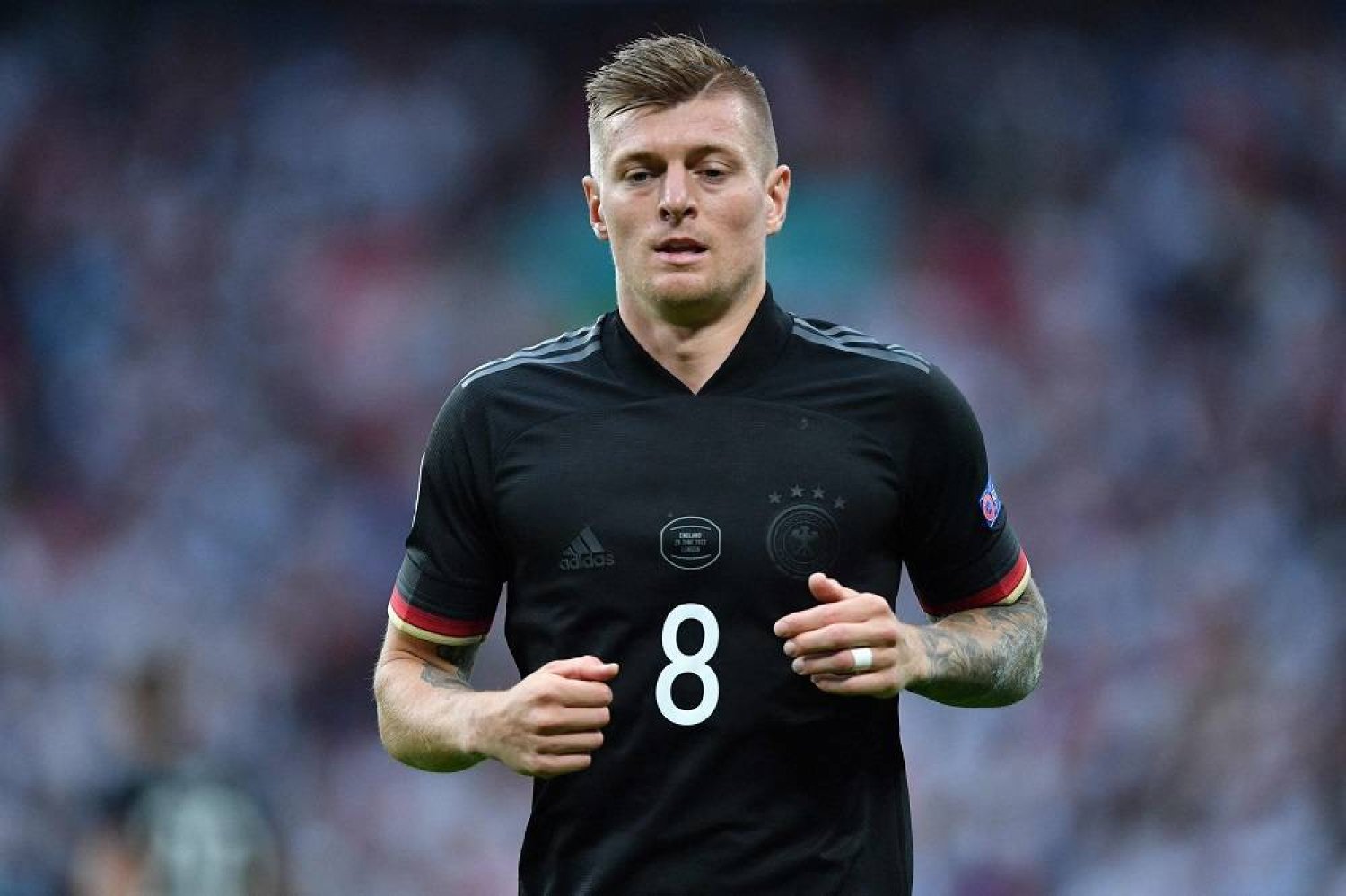 Germany's midfielder Toni Kroos jogs during the UEFA Euro 2020 round of 16 football match between England and Germany at Wembley Stadium in London on June 29, 2021. (AFP)