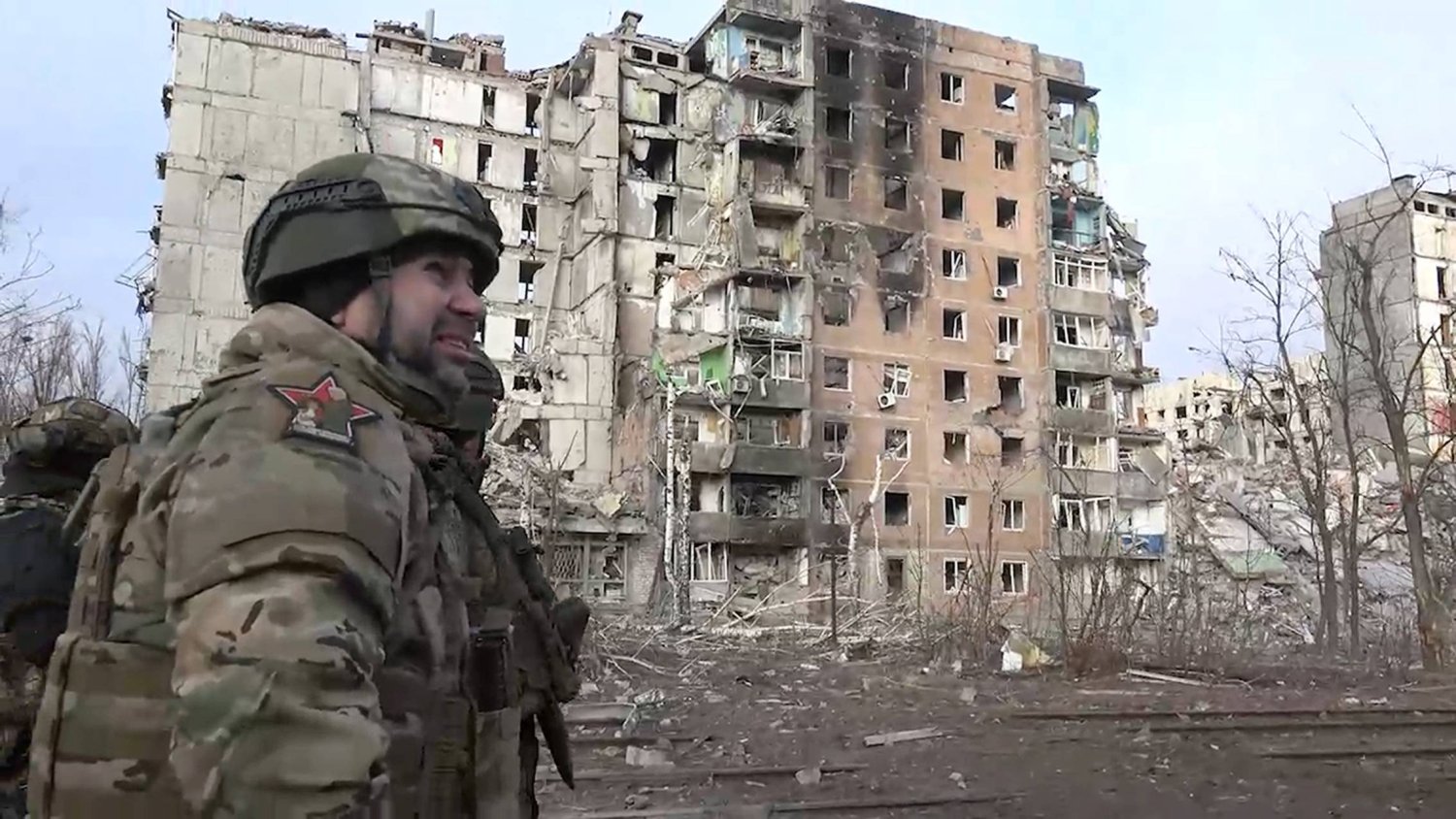 In this grab taken from video released by the head of the Russian-controlled Donetsk region Denis Pushilin's telegram channel on Saturday, Feb. 24, 2024, Denis Pushilin, head of the Russian-controlled Donetsk region, walks past damaged buildings, after Russian forces completed their takeover of Avdiivka, eastern Ukraine. (Head of the Russian-controlled Donetsk region Denis Pushilin telegram channel via AP)
