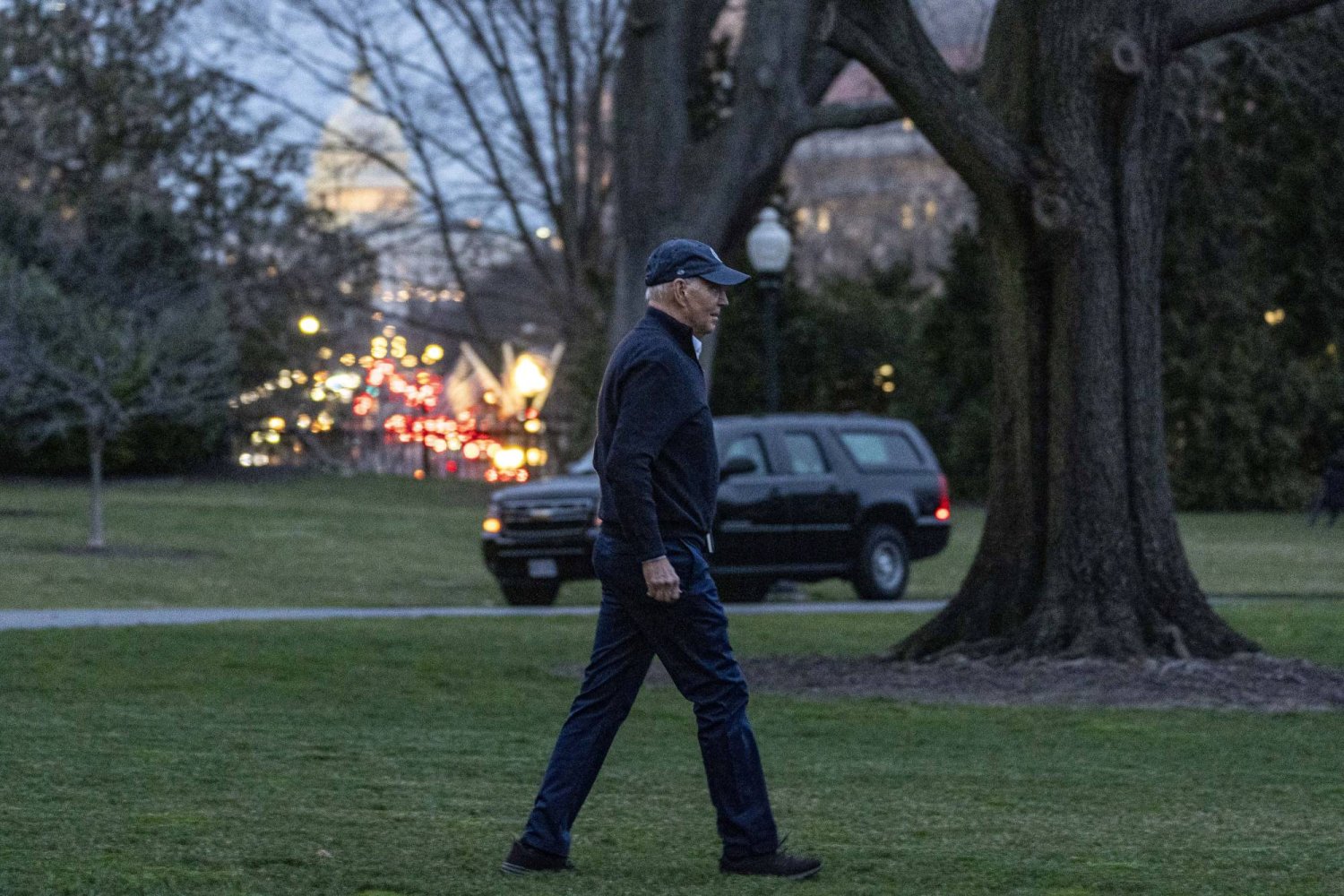 The Dome of the US Capitol Building is visible as President Joe Biden walks towards Marine One on the South Lawn of the White House in Washington, Friday, March 1, 2024, to travel to Camp David, Md., for the weekend. (AP Photo/Andrew Harnik)