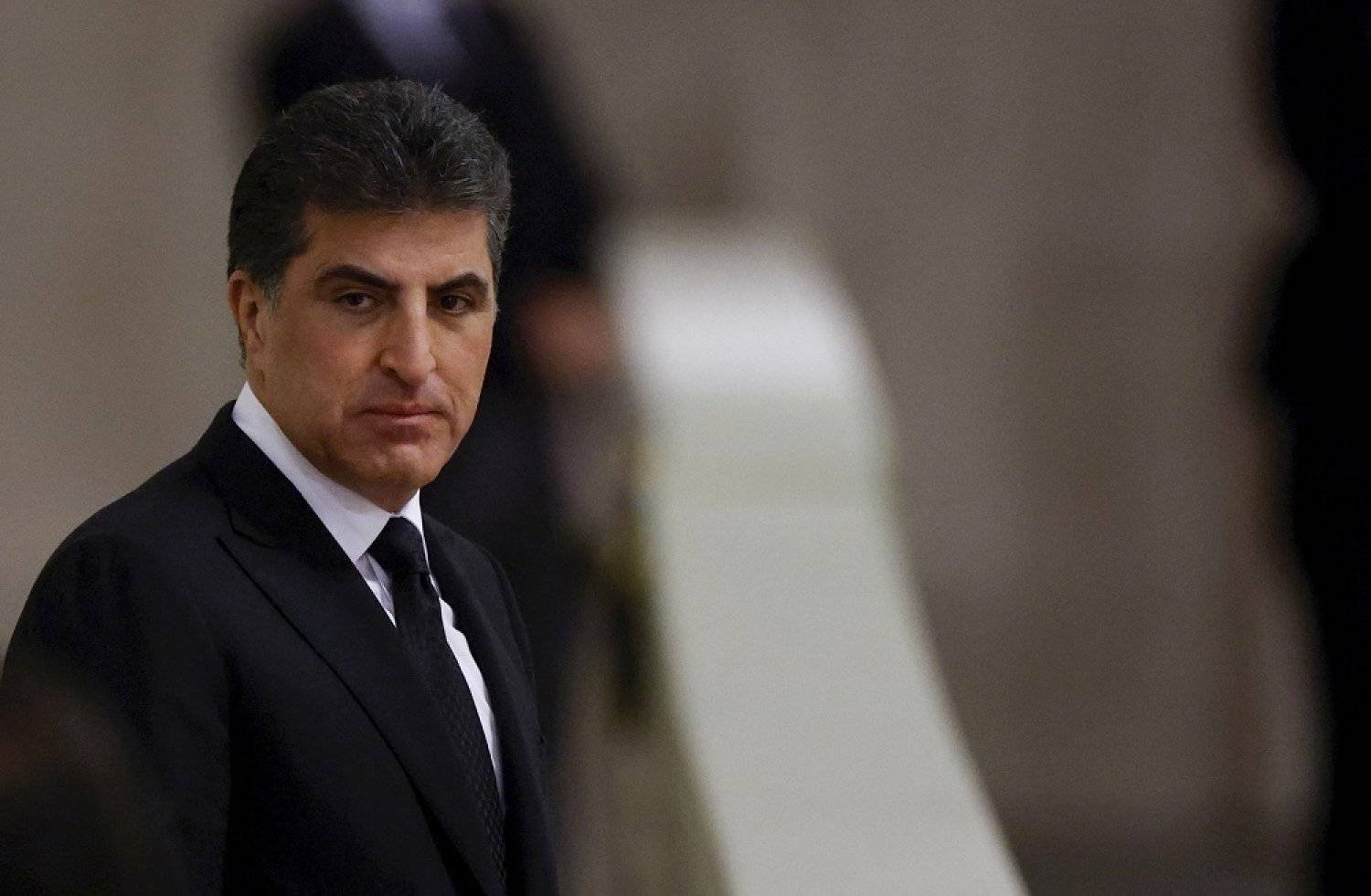 President of the Kurdistan Region in Iraq, Nechirvan Barzani pays his respects to Britain's Queen Elizabeth II, following her death, during her lying in state at Westminster Hall, in Westminster Palace, in London, Sunday, Sept. 18, 2022. (AP) 