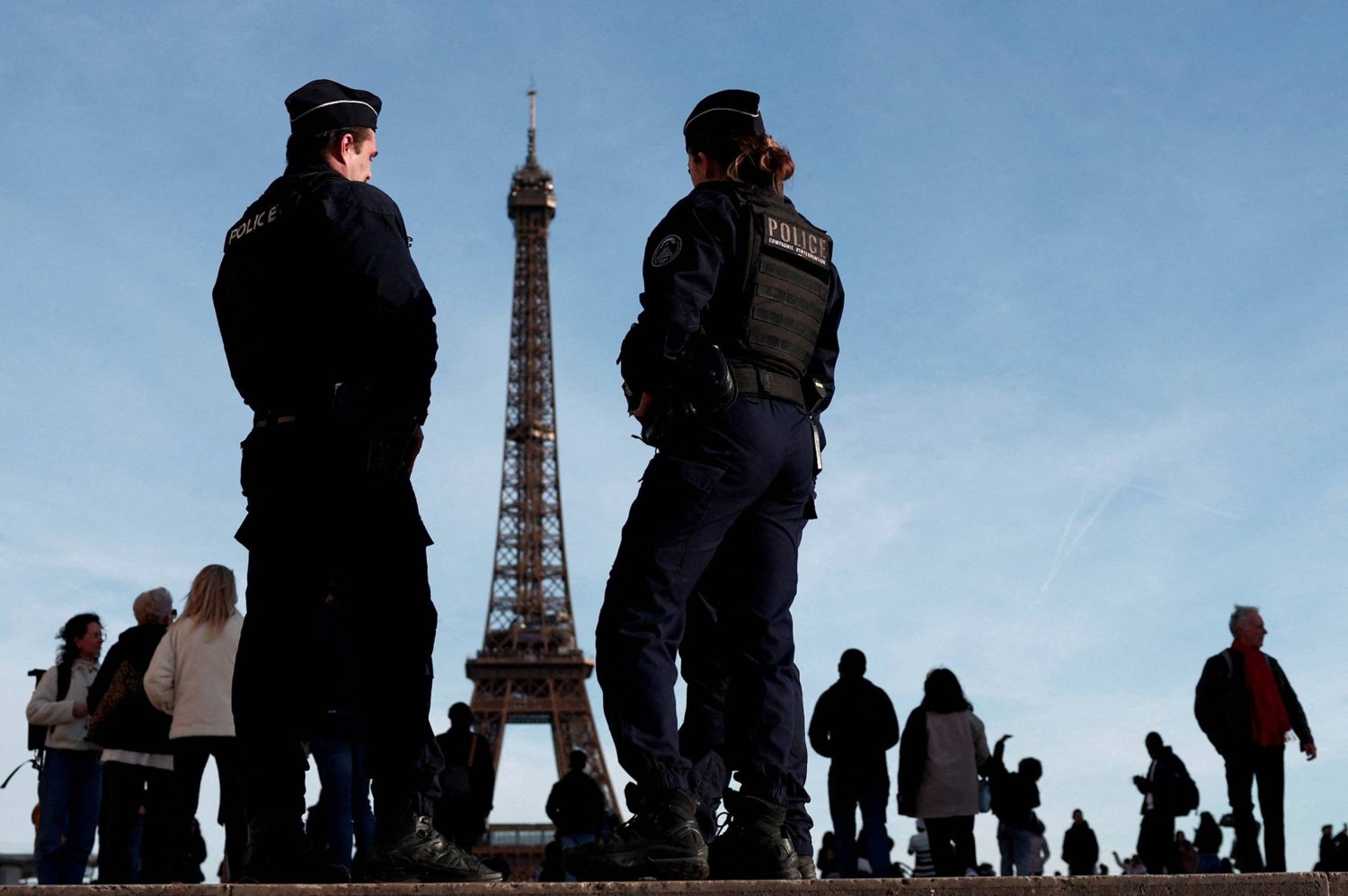 FILE PHOTO: French police patrol at the Trocadero square near the Eiffel Tower in Paris, France, March 4, 2024. REUTERS/Gonzalo Fuentes/File Photo
