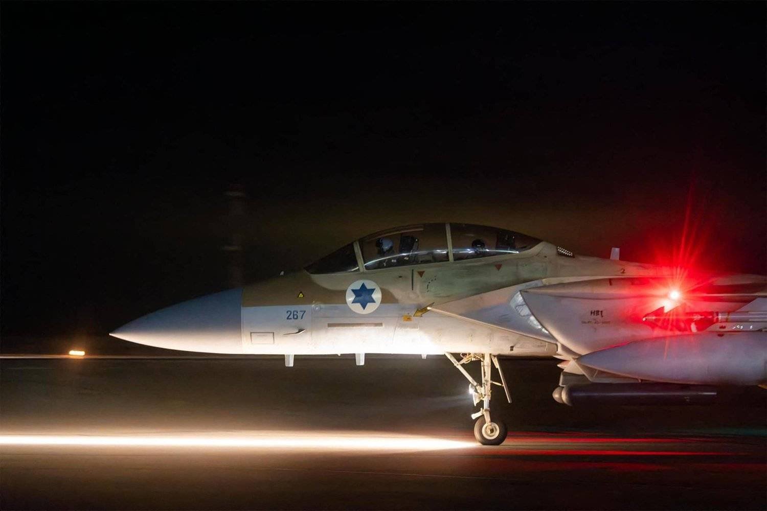 An Israeli Air Force fighter at an unidentified airport on Sunday (AFP)

 